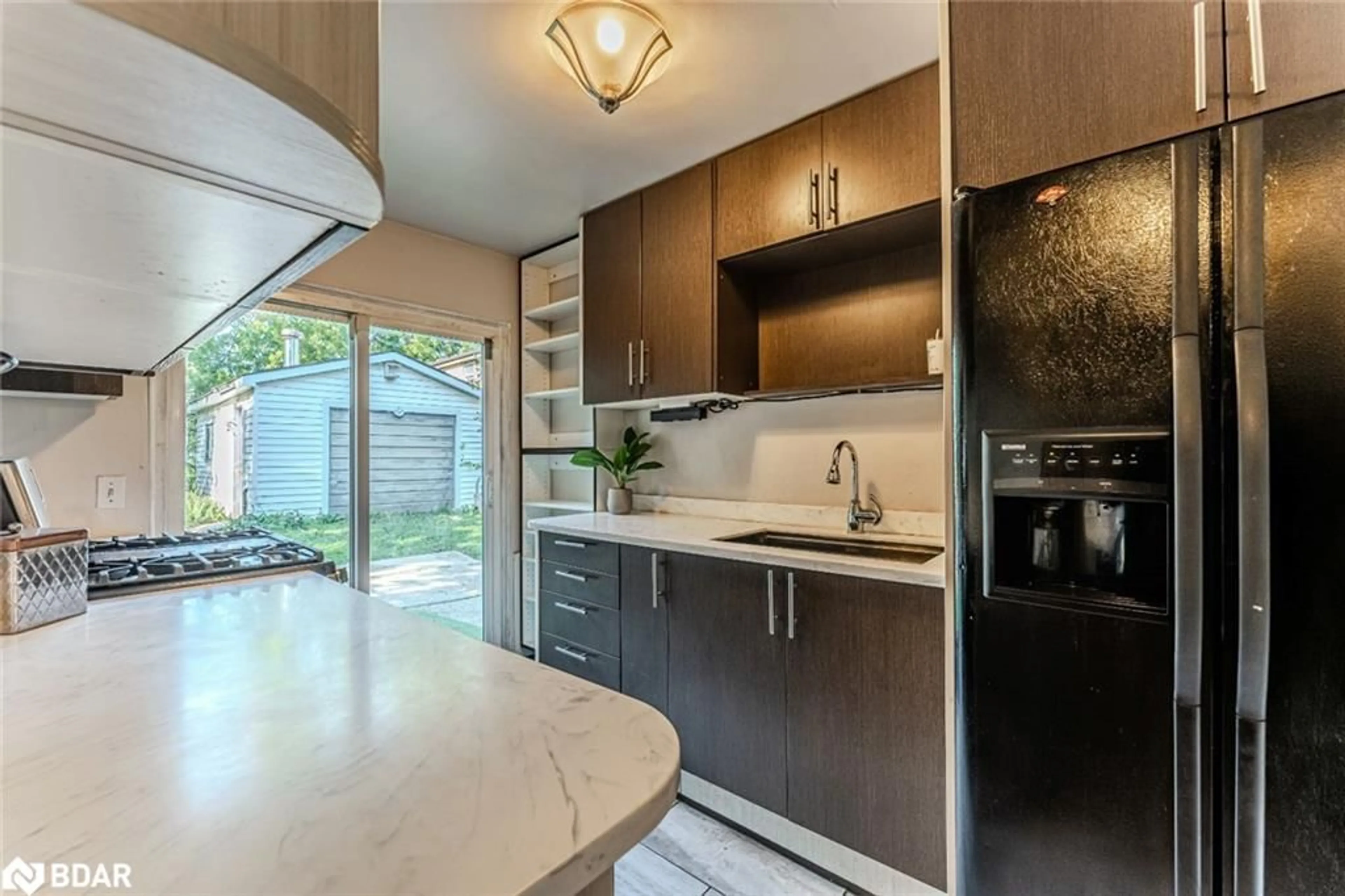 Open concept kitchen, ceramic/tile floor for 30 North St, Barrie Ontario L4M 2R9