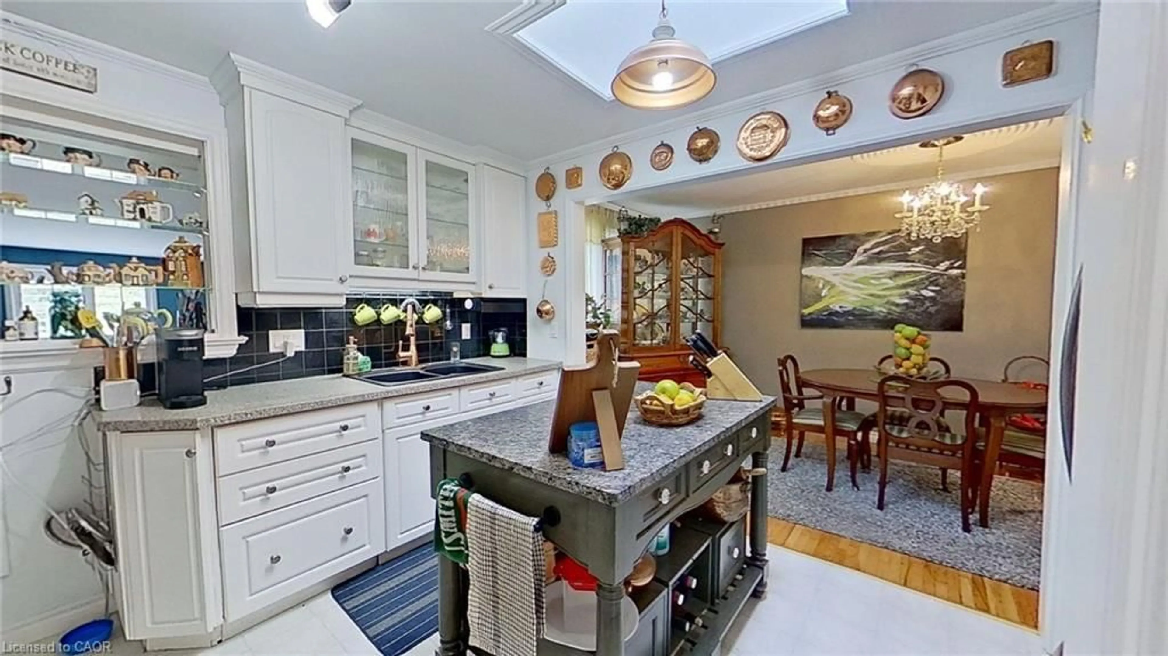 Open concept kitchen, ceramic/tile floor for 27 Hepburn Ave, St. Thomas Ontario N5R 4J4