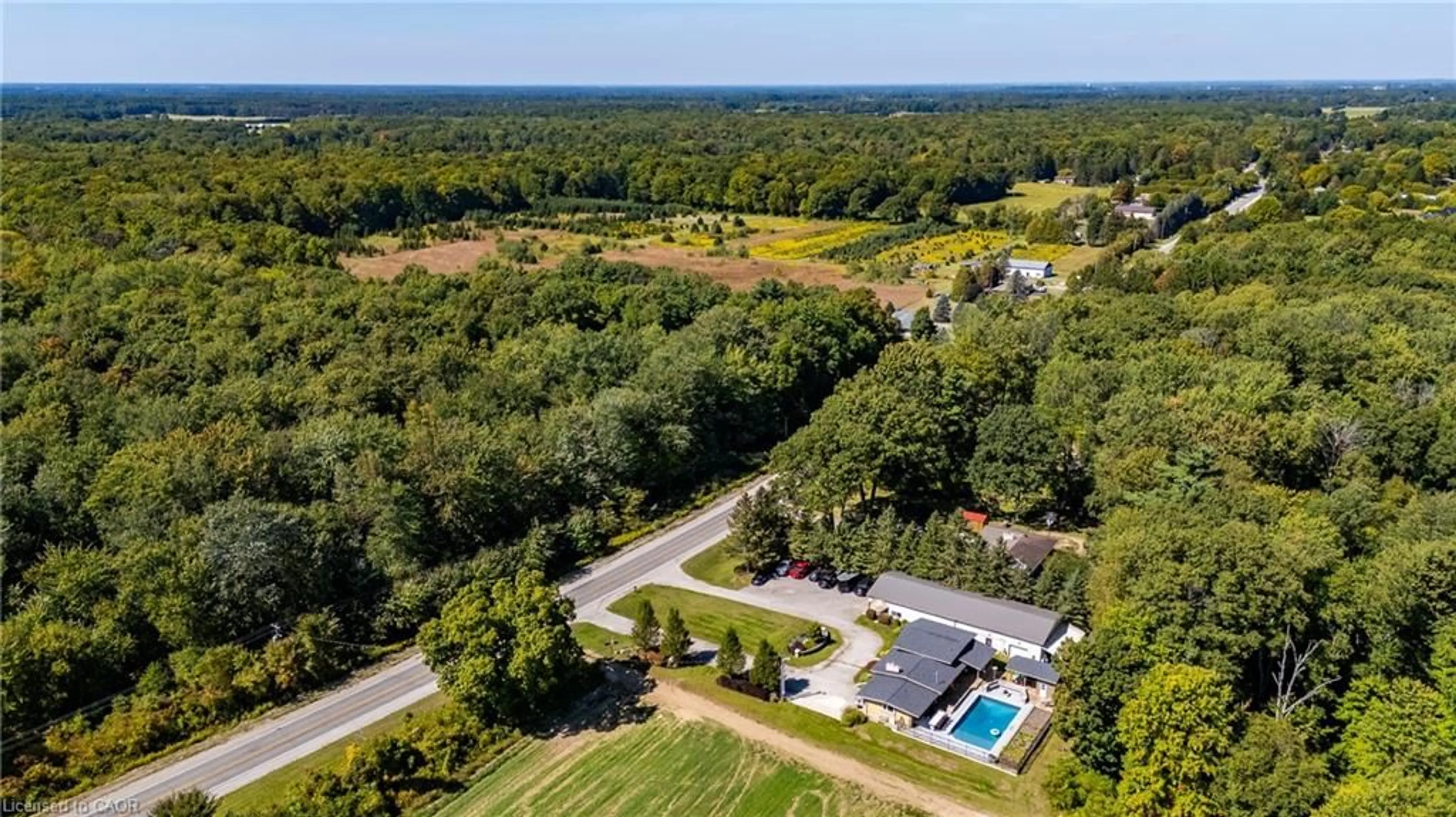 A pic from outside/outdoor area/front of a property/back of a property/a pic from drone, unknown for 1750 Turkey Point Rd, Simcoe Ontario N3Y 4J9