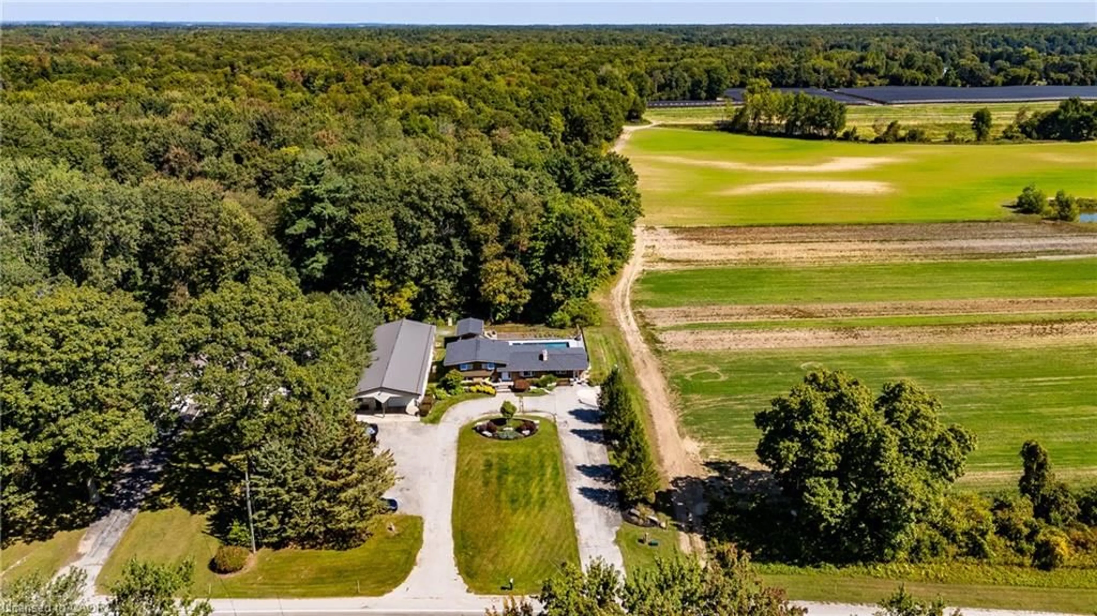 A pic from outside/outdoor area/front of a property/back of a property/a pic from drone, water/lake/river/ocean view for 1750 Turkey Point Rd, Simcoe Ontario N3Y 4J9