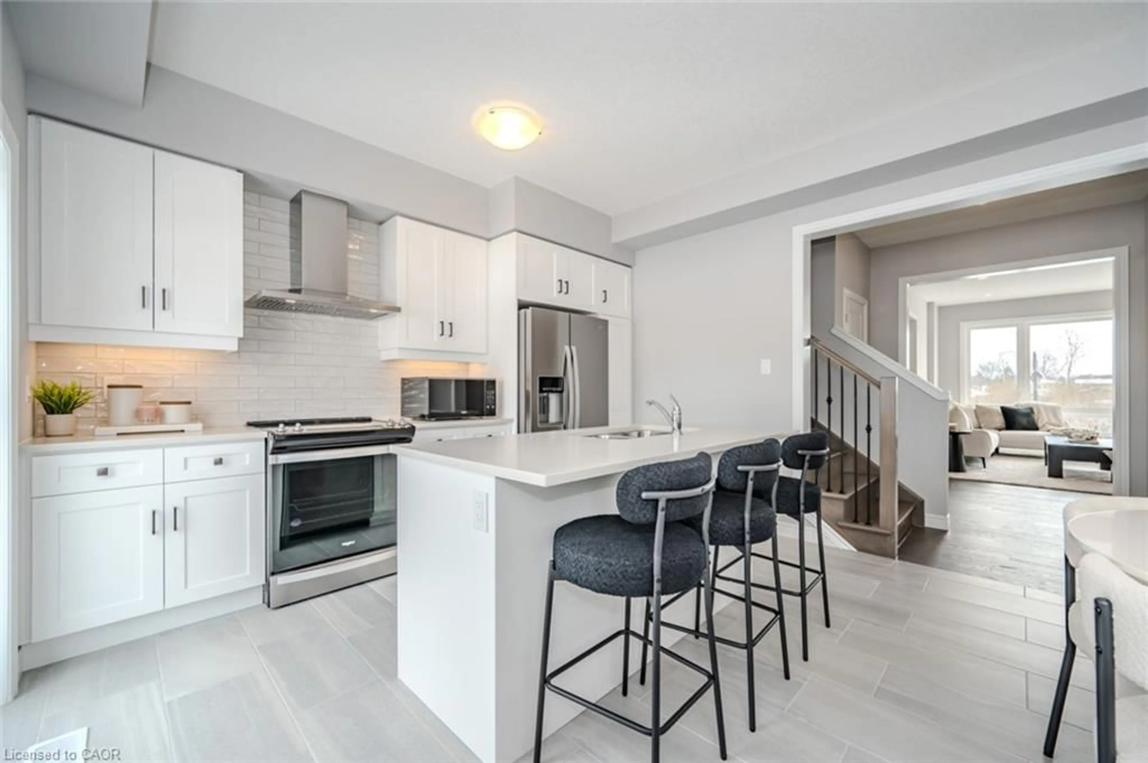 Open concept kitchen, ceramic/tile floor for 23 Sora Lane, Guelph Ontario N1E 0T4