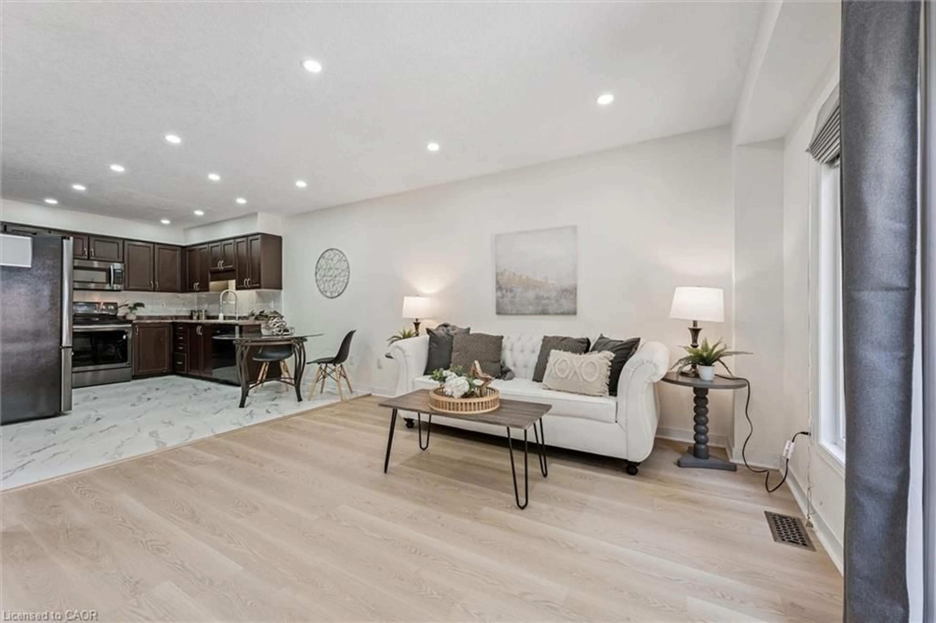 Living room with furniture, unknown for 110 Activa Ave #E29, Kitchener Ontario N2E 3T3