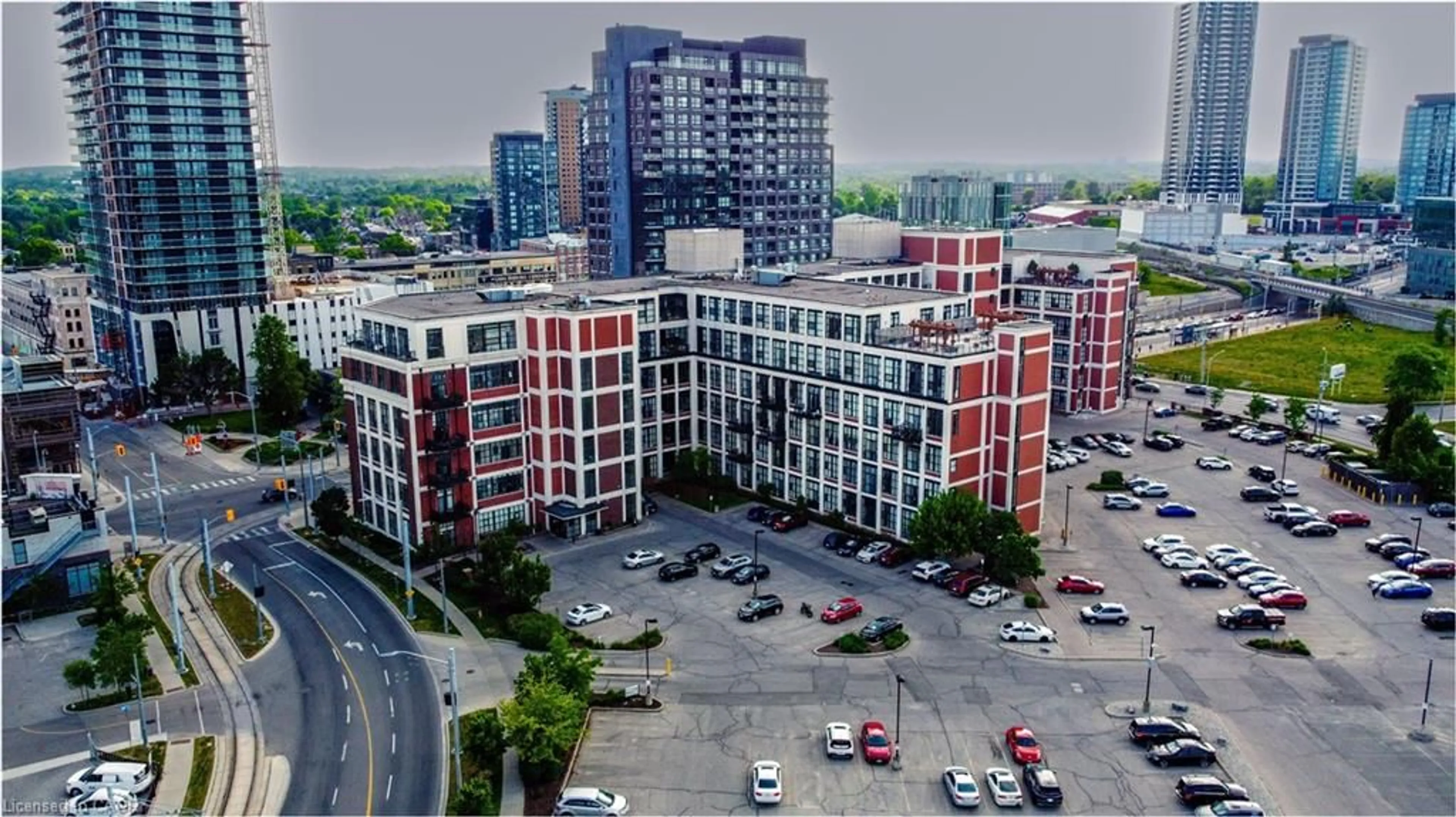 A pic from outside/outdoor area/front of a property/back of a property/a pic from drone, city buildings view from balcony for 404 King St #524, Kitchener Ontario N2G 2L5