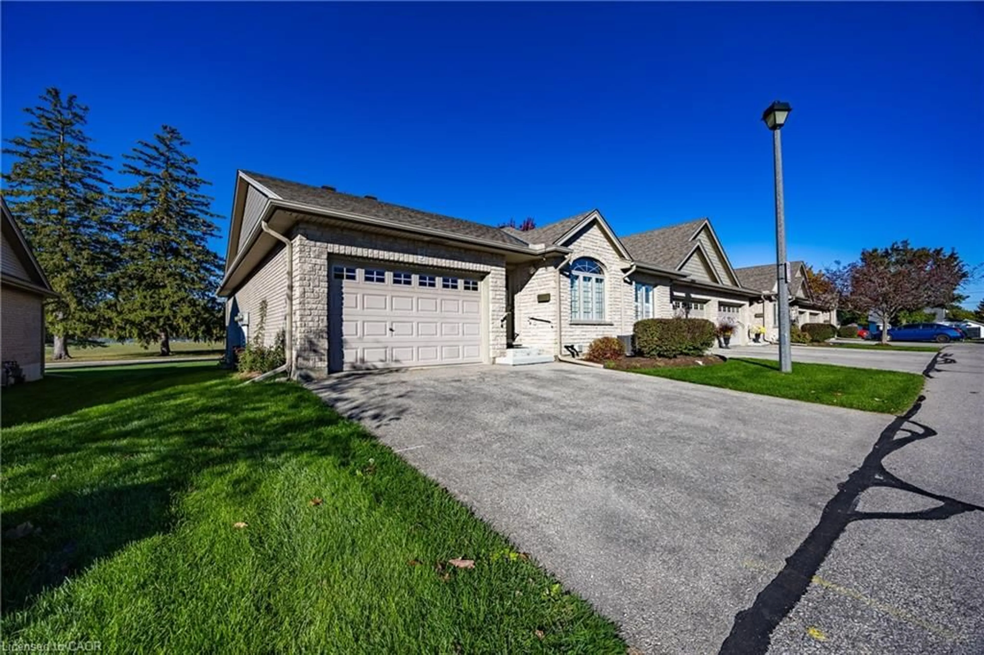 A pic from outside/outdoor area/front of a property/back of a property/a pic from drone, street for 510 Queensway #5, Simcoe Ontario N3Y 4R4