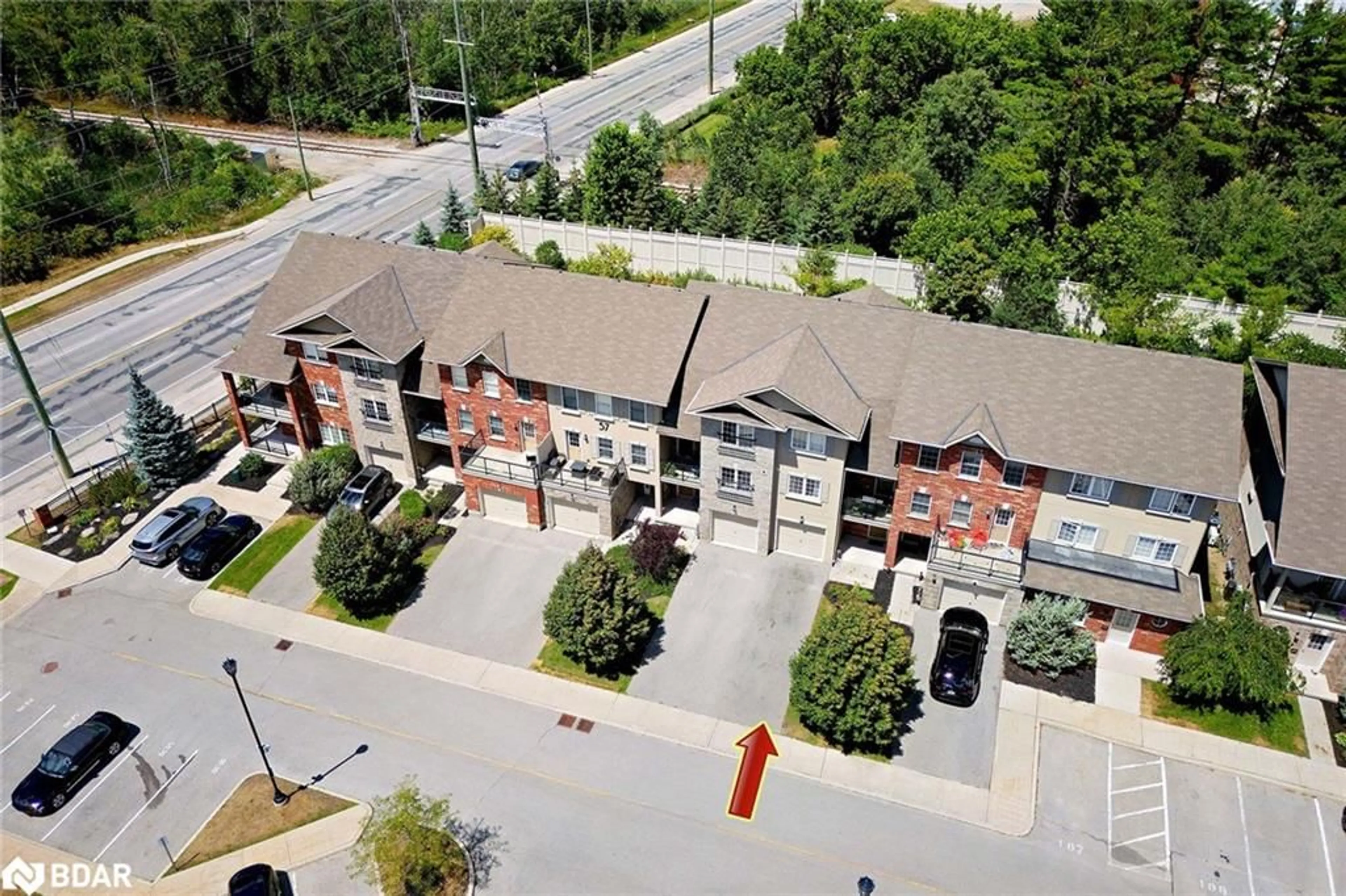 A pic from outside/outdoor area/front of a property/back of a property/a pic from drone, unknown for 57 Ferndale Dr #7, Barrie Ontario L4N 5T6