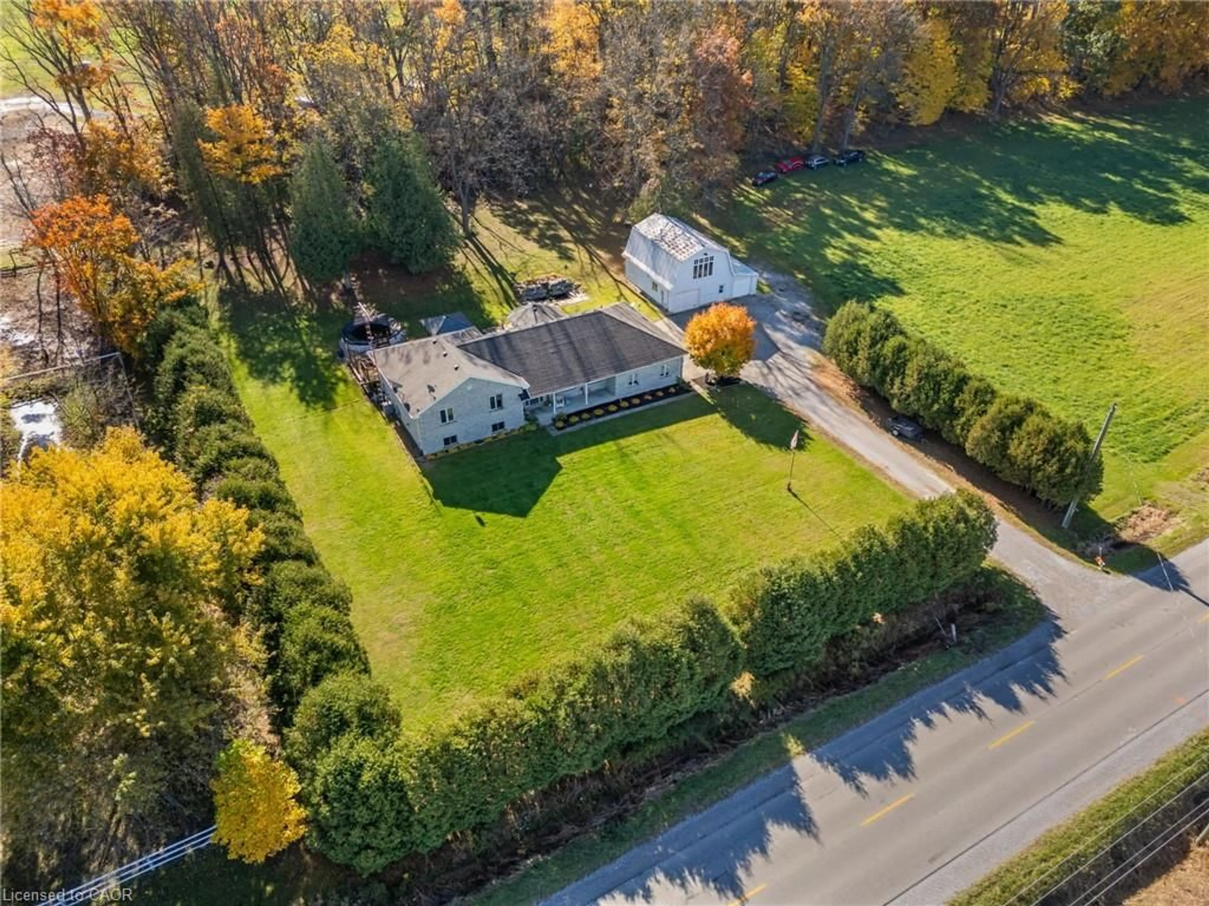 A pic from outside/outdoor area/front of a property/back of a property/a pic from drone, street for 1306 St Johns Rd, Simcoe Ontario N3Y 4K1