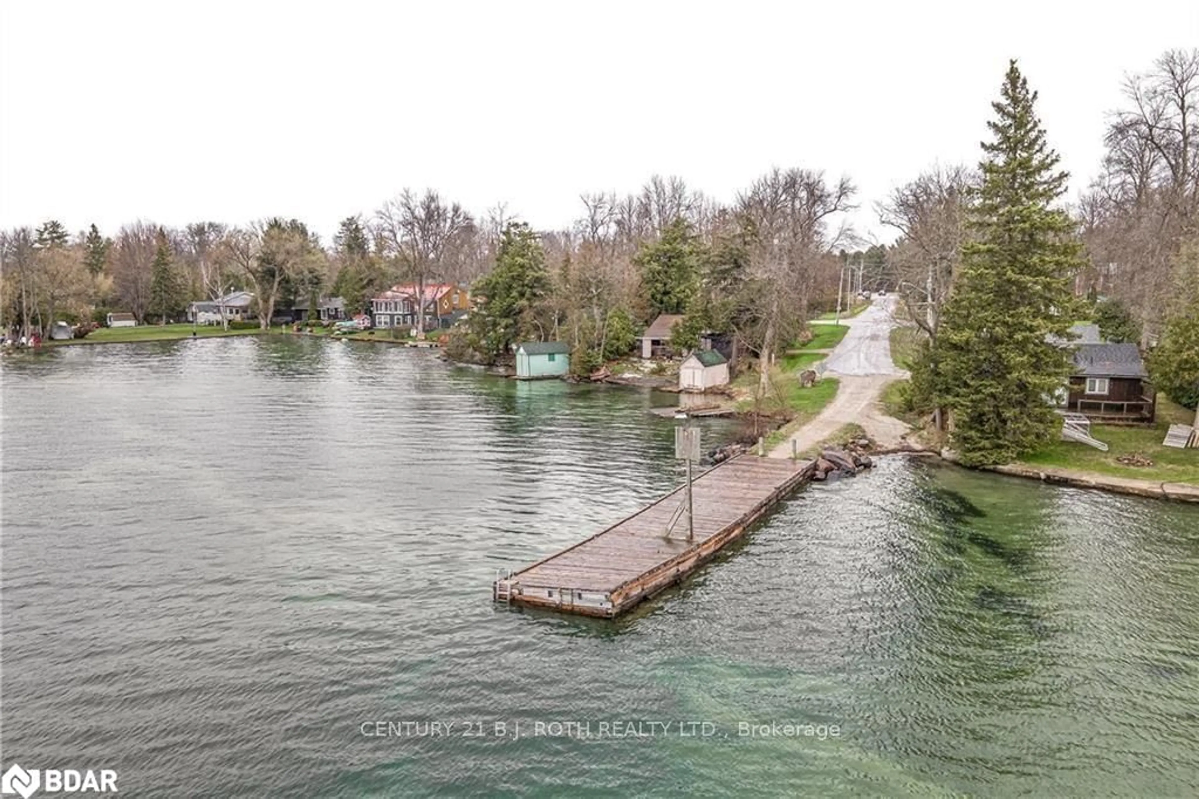 A pic from outside/outdoor area/front of a property/back of a property/a pic from drone, water/lake/river/ocean view for 7187 Beach Dr, Washago Ontario L0K 2B0