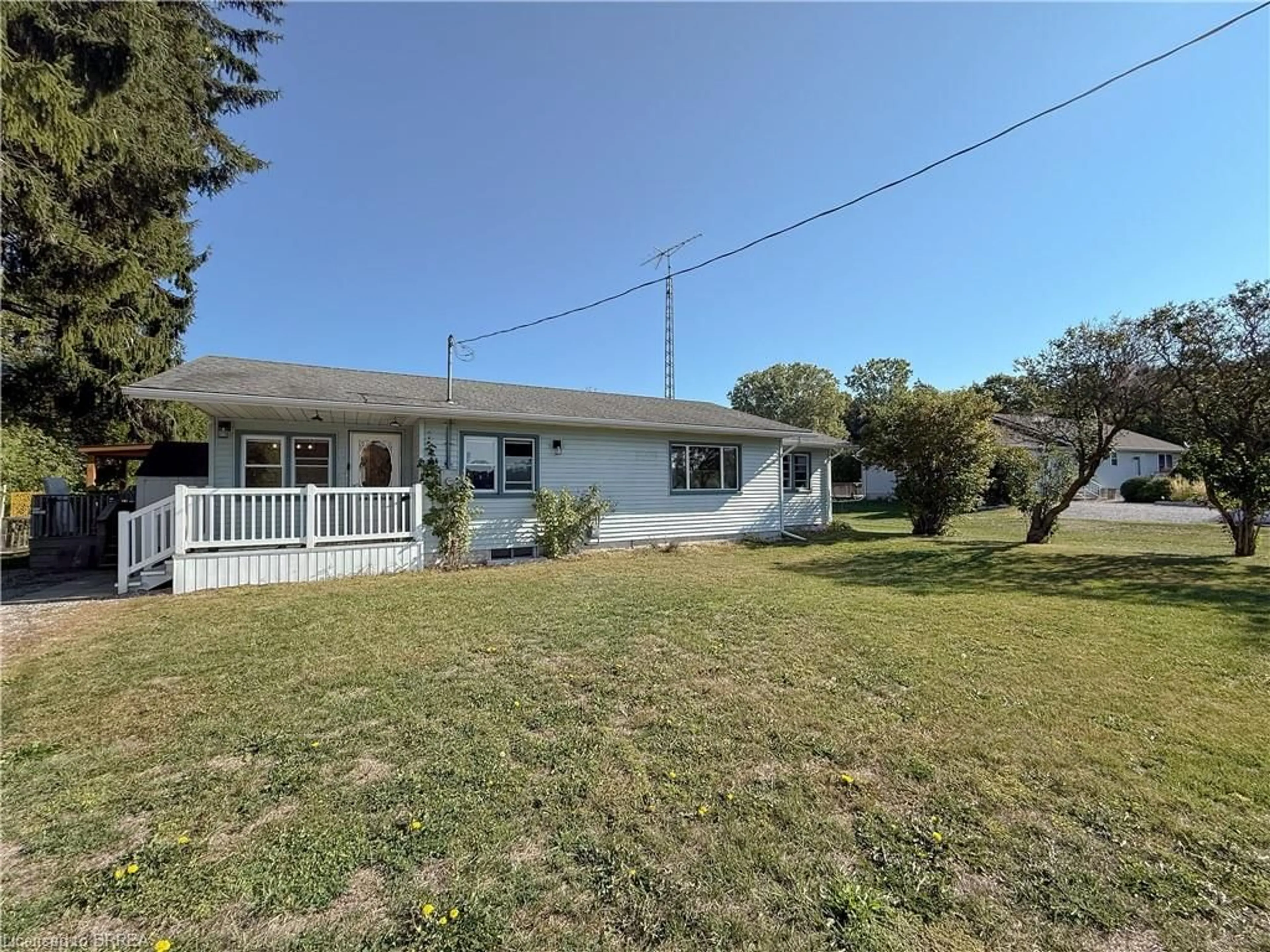 A pic from outside/outdoor area/front of a property/back of a property/a pic from drone, unknown for 971 Fairground Rd, Clear Creek Ontario N0E 1G0