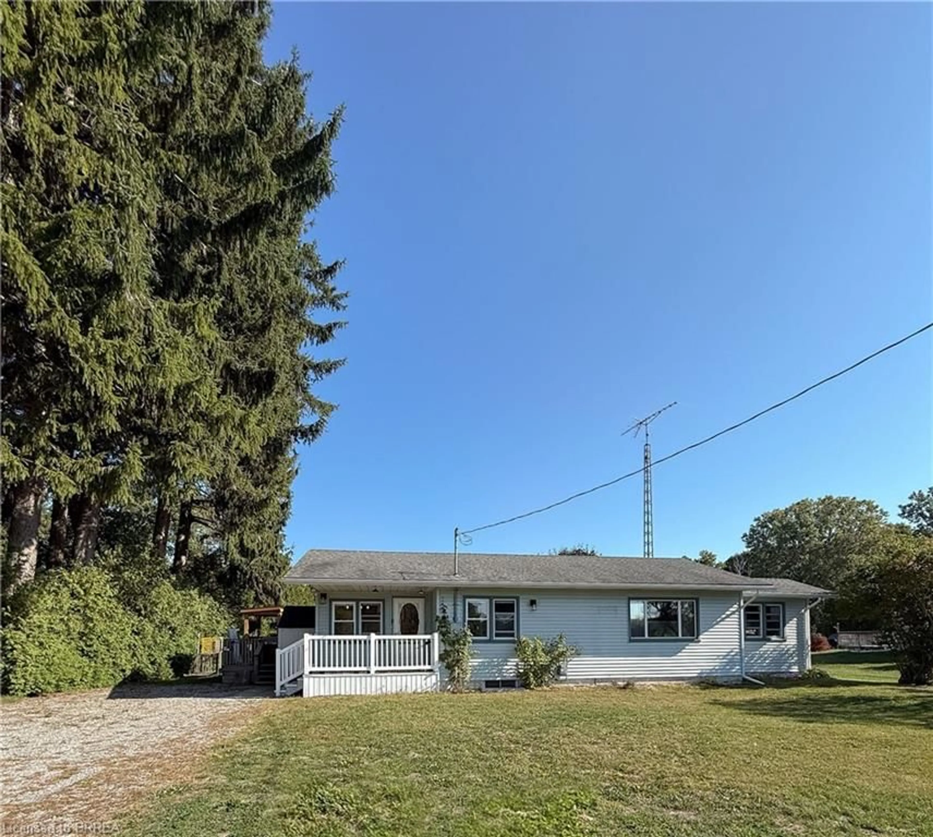 A pic from outside/outdoor area/front of a property/back of a property/a pic from drone, street for 971 Fairground Rd, Clear Creek Ontario N0E 1G0