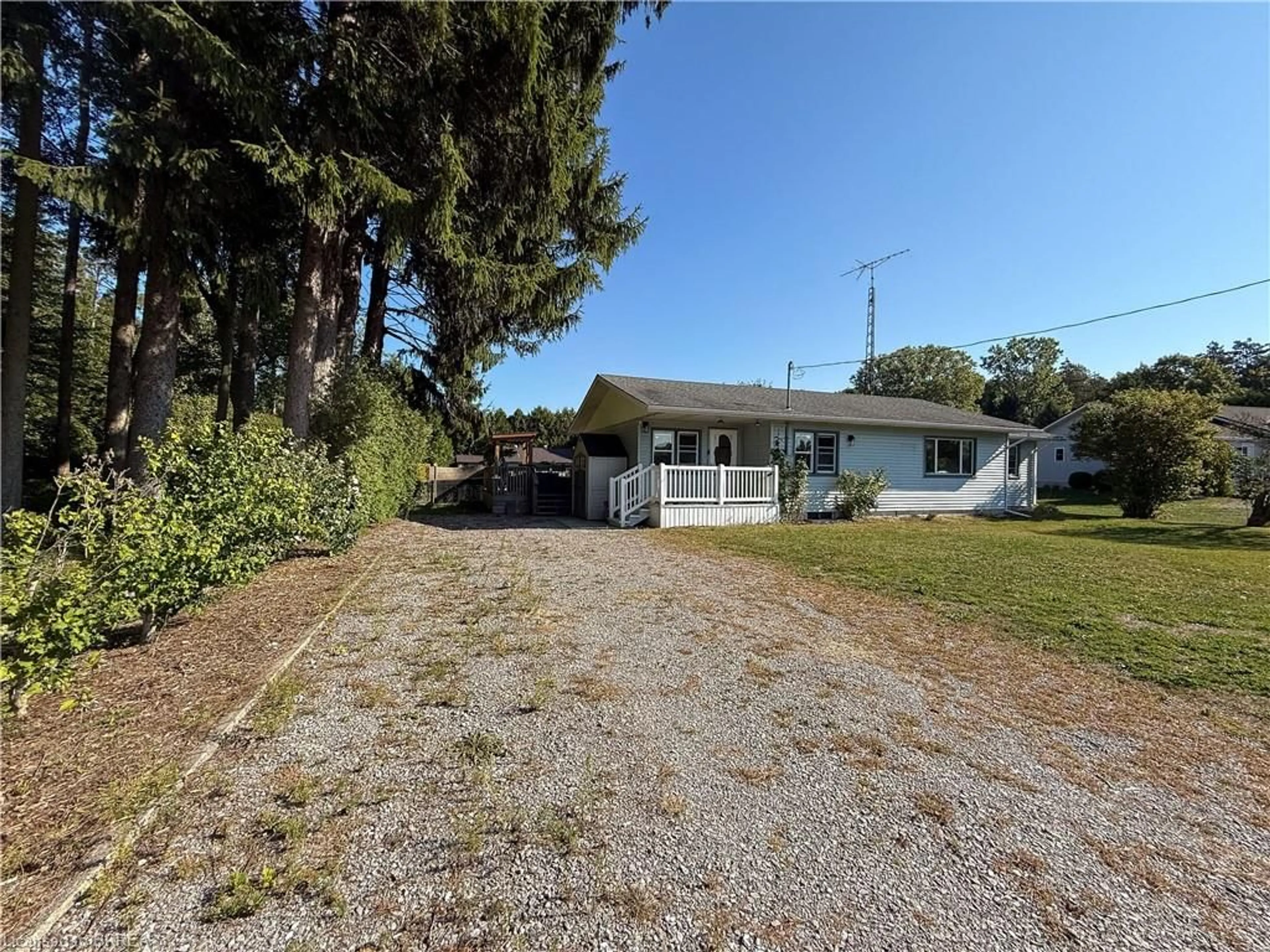 A pic from outside/outdoor area/front of a property/back of a property/a pic from drone, street for 971 Fairground Rd, Clear Creek Ontario N0E 1G0