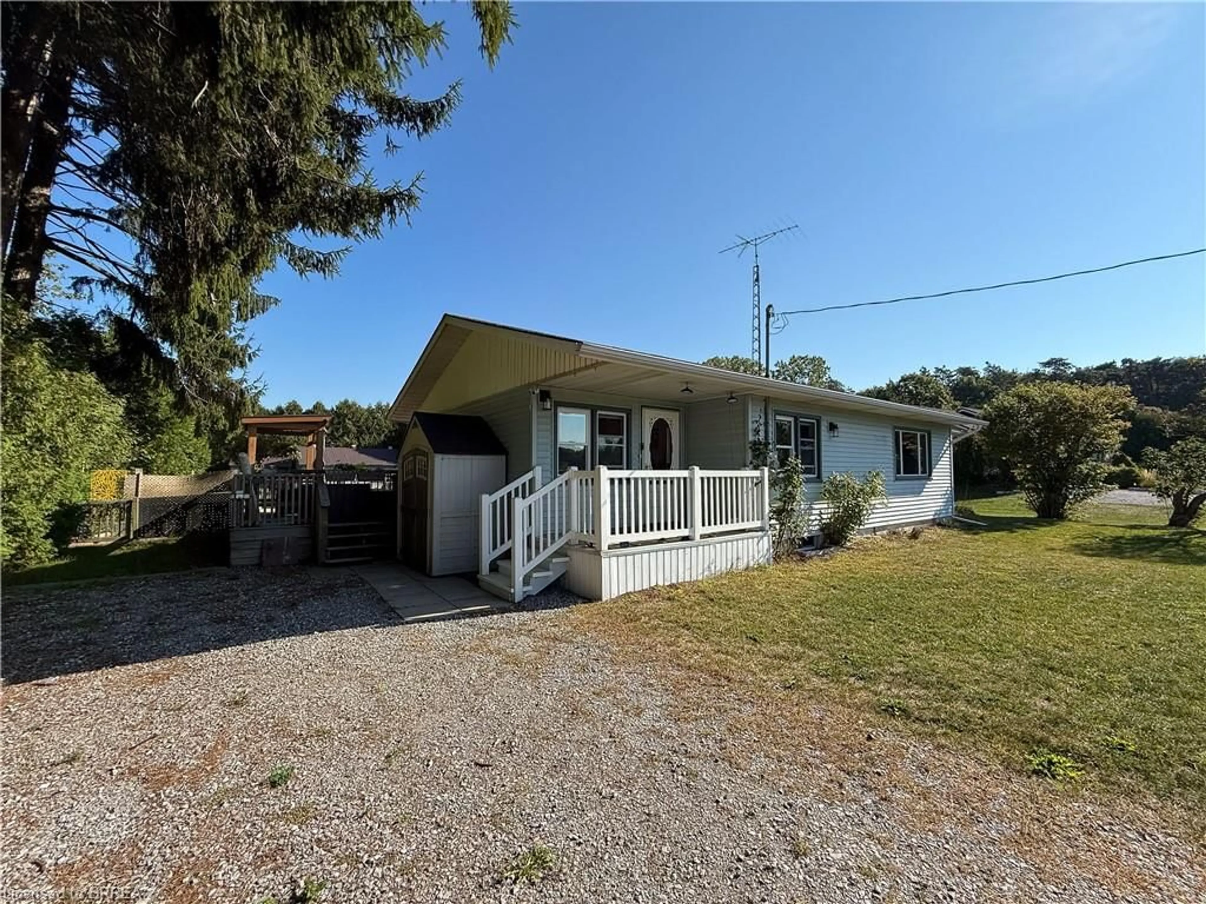 A pic from outside/outdoor area/front of a property/back of a property/a pic from drone, unknown for 971 Fairground Rd, Clear Creek Ontario N0E 1G0