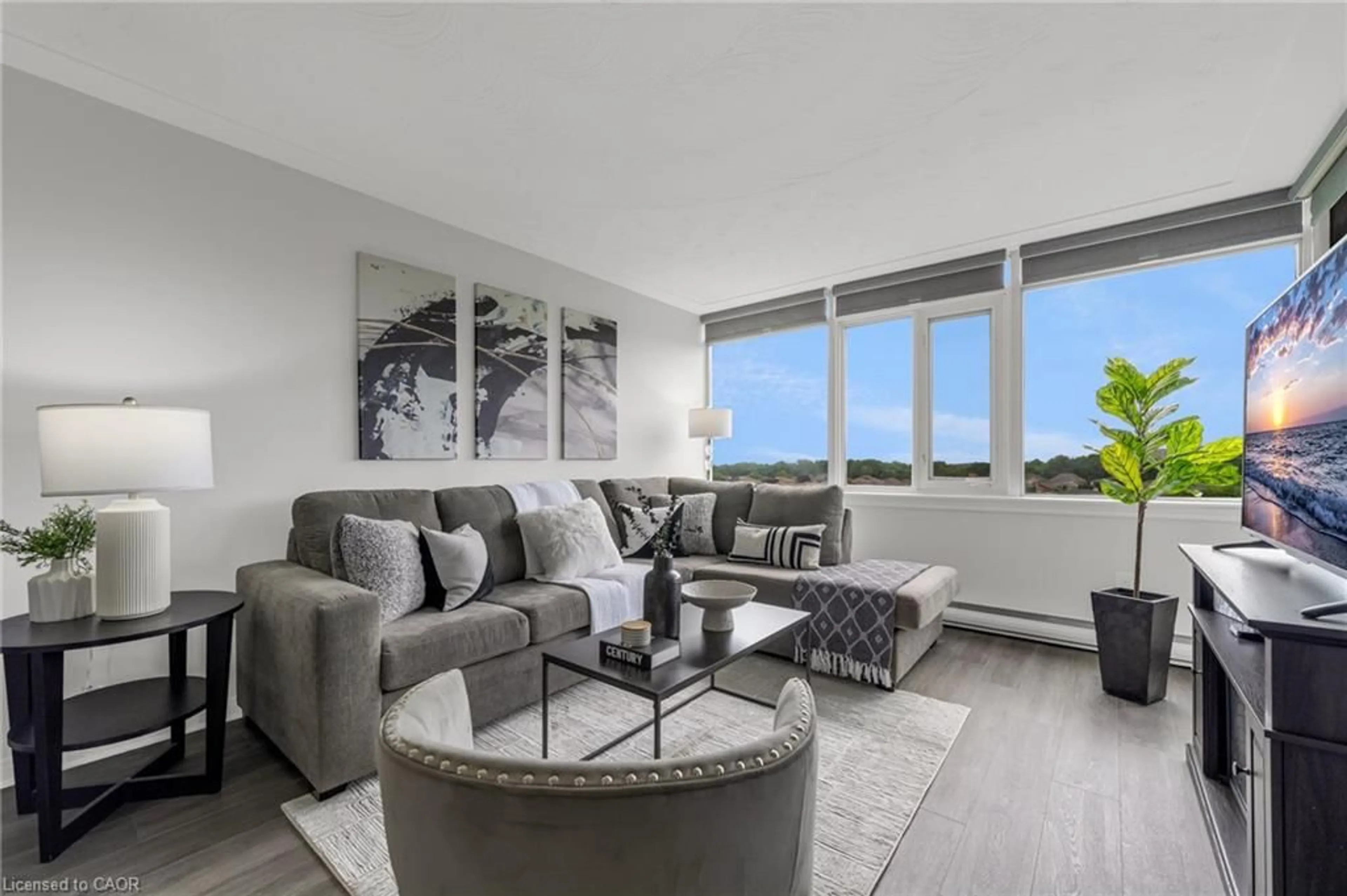 Living room with furniture, unknown for 40 Harrisford St #608, Hamilton Ontario L8K 6N1