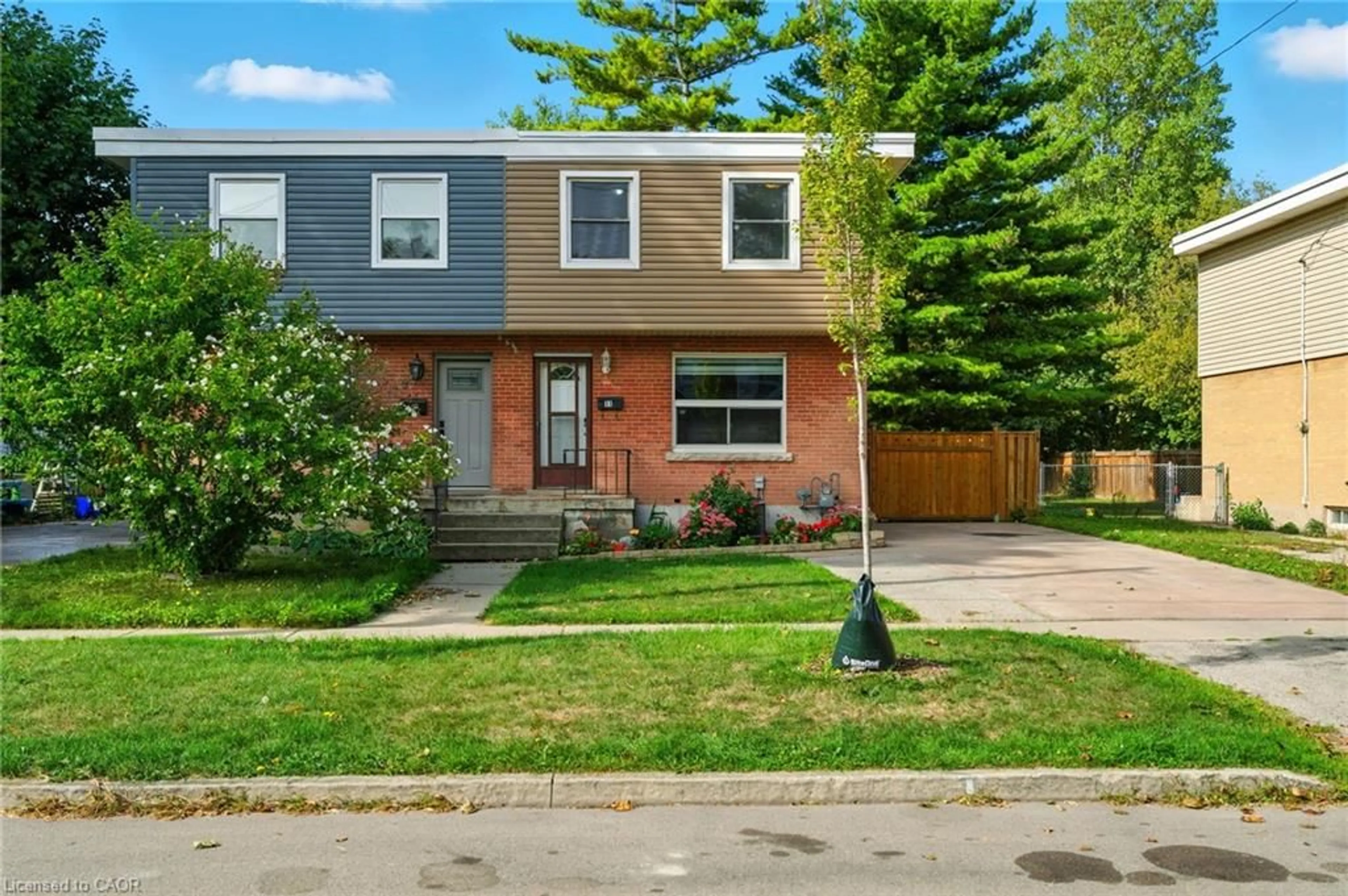 Home with brick exterior material, street for 11 Eastvale Pl, Hamilton Ontario L8H 1N9