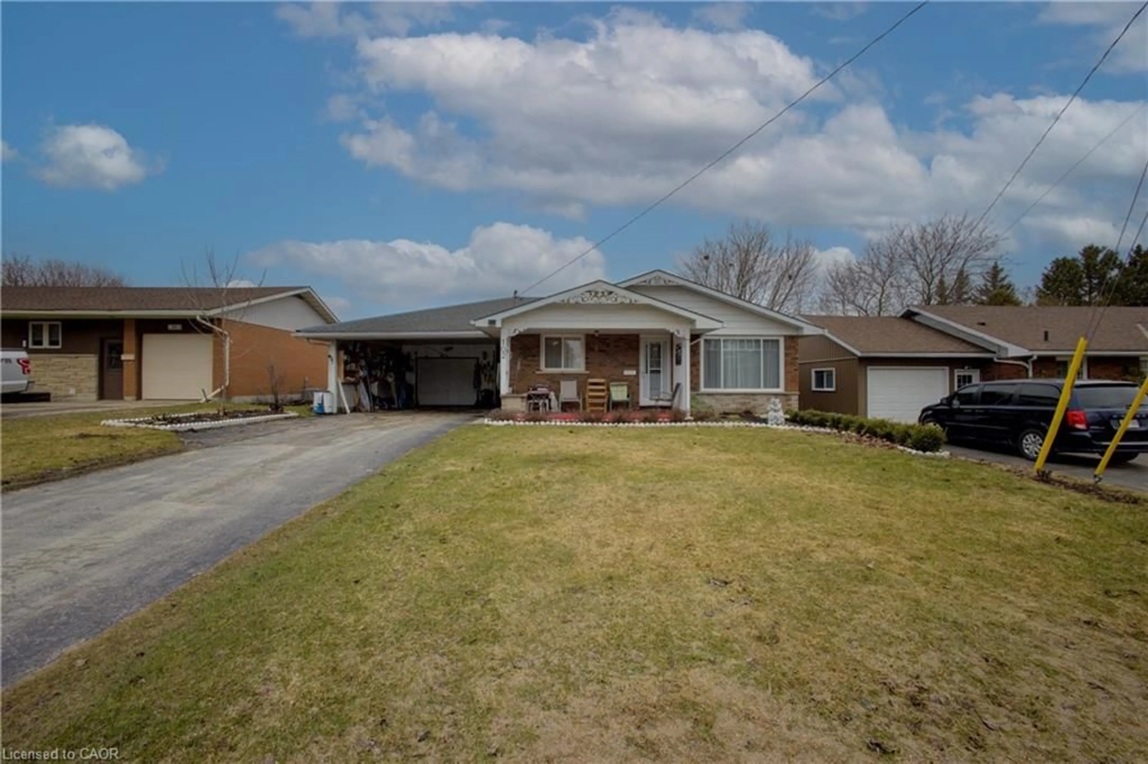 A pic from outside/outdoor area/front of a property/back of a property/a pic from drone, street for 102 Byeland Dr, Mount Forest Ontario N0G 2L2