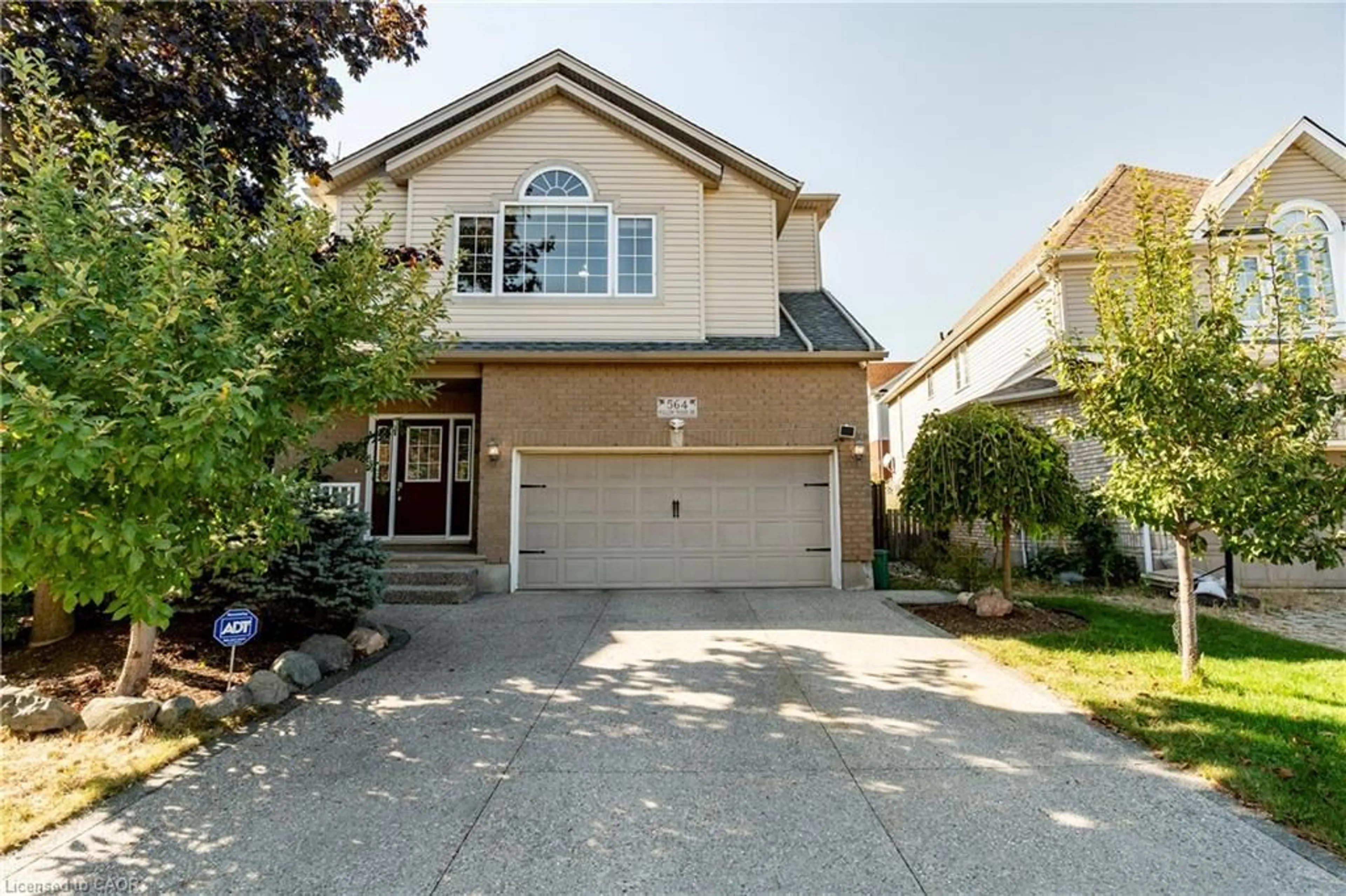 Home with vinyl exterior material, street for 564 Willow Wood Dr, Waterloo Ontario N2T 2T5