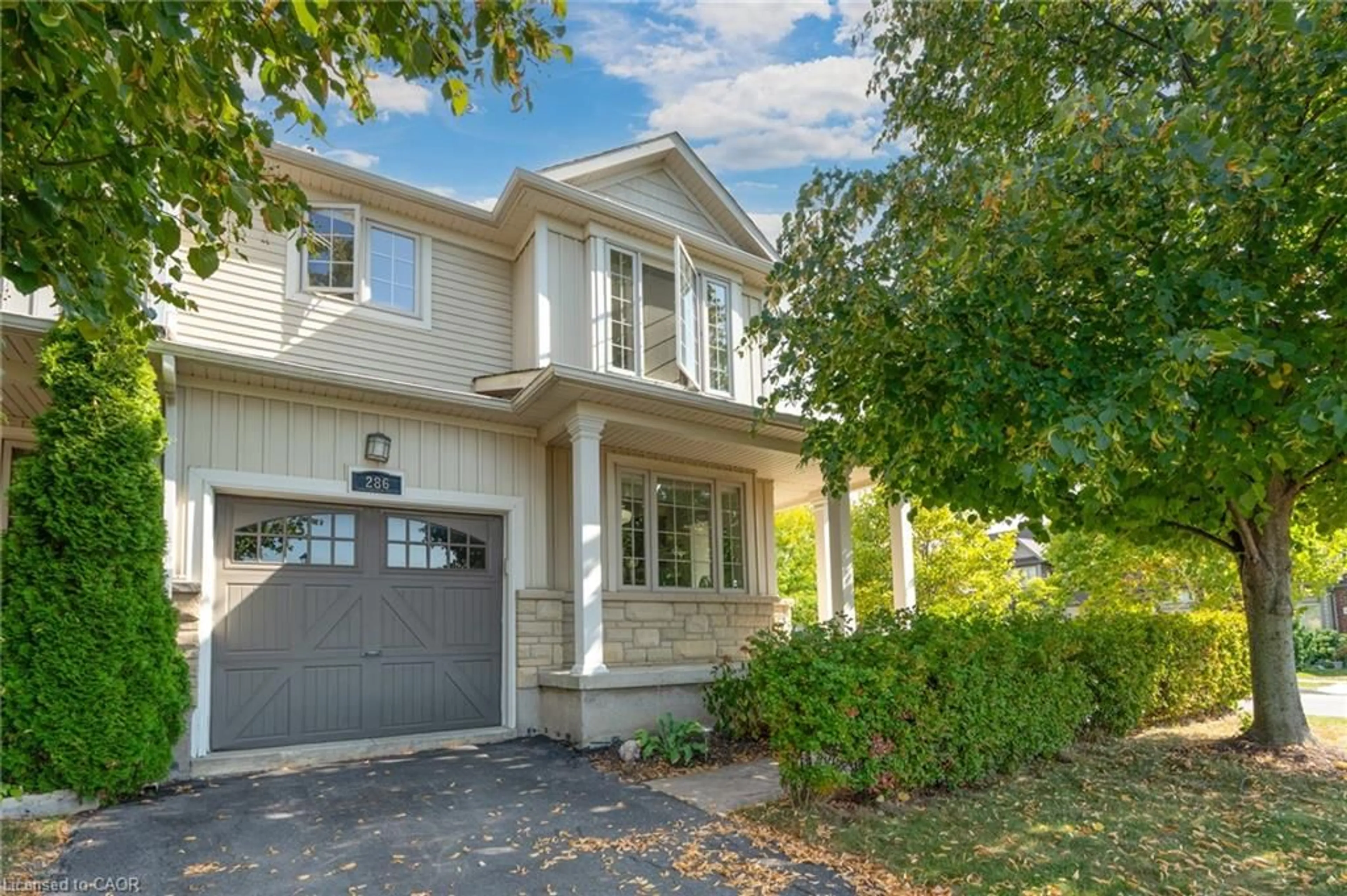Home with vinyl exterior material, street for 286 Fall Fair Way, Binbrook Ontario L0R 1C0