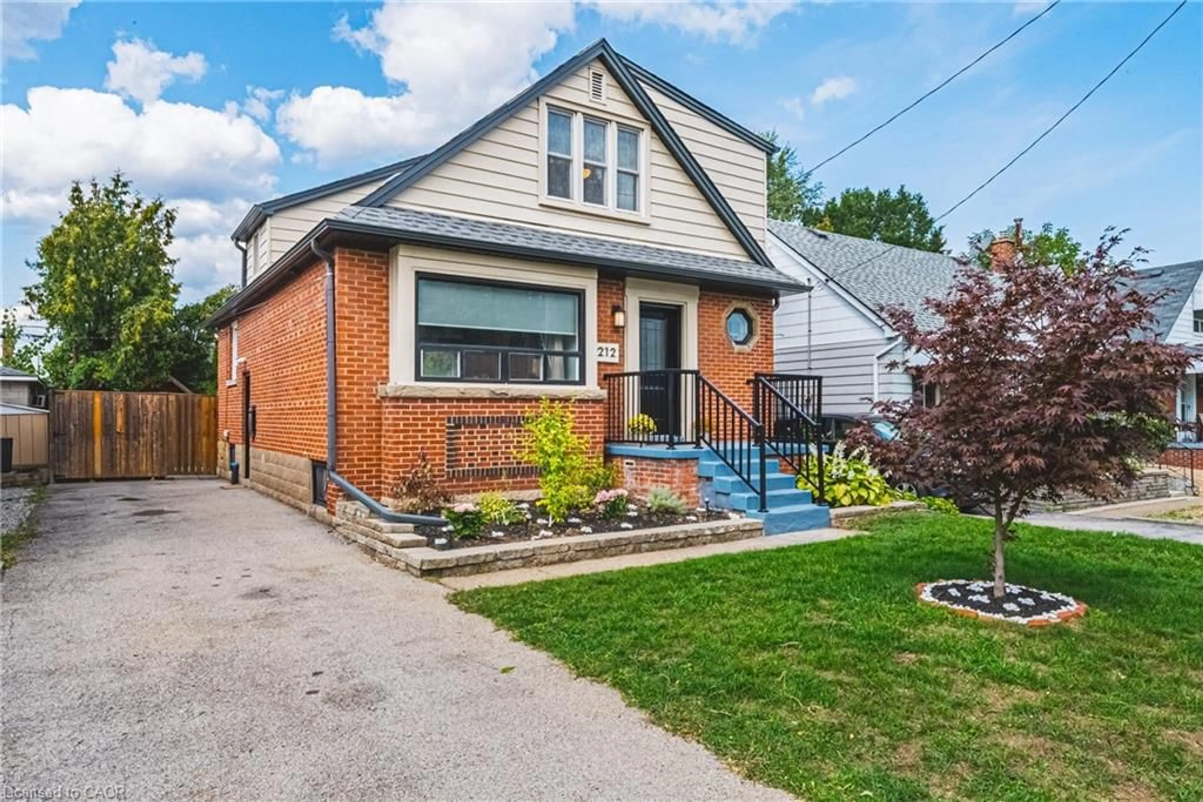 Home with brick exterior material, street for 212 Rodgers Rd, Hamilton Ontario L8K 3C4
