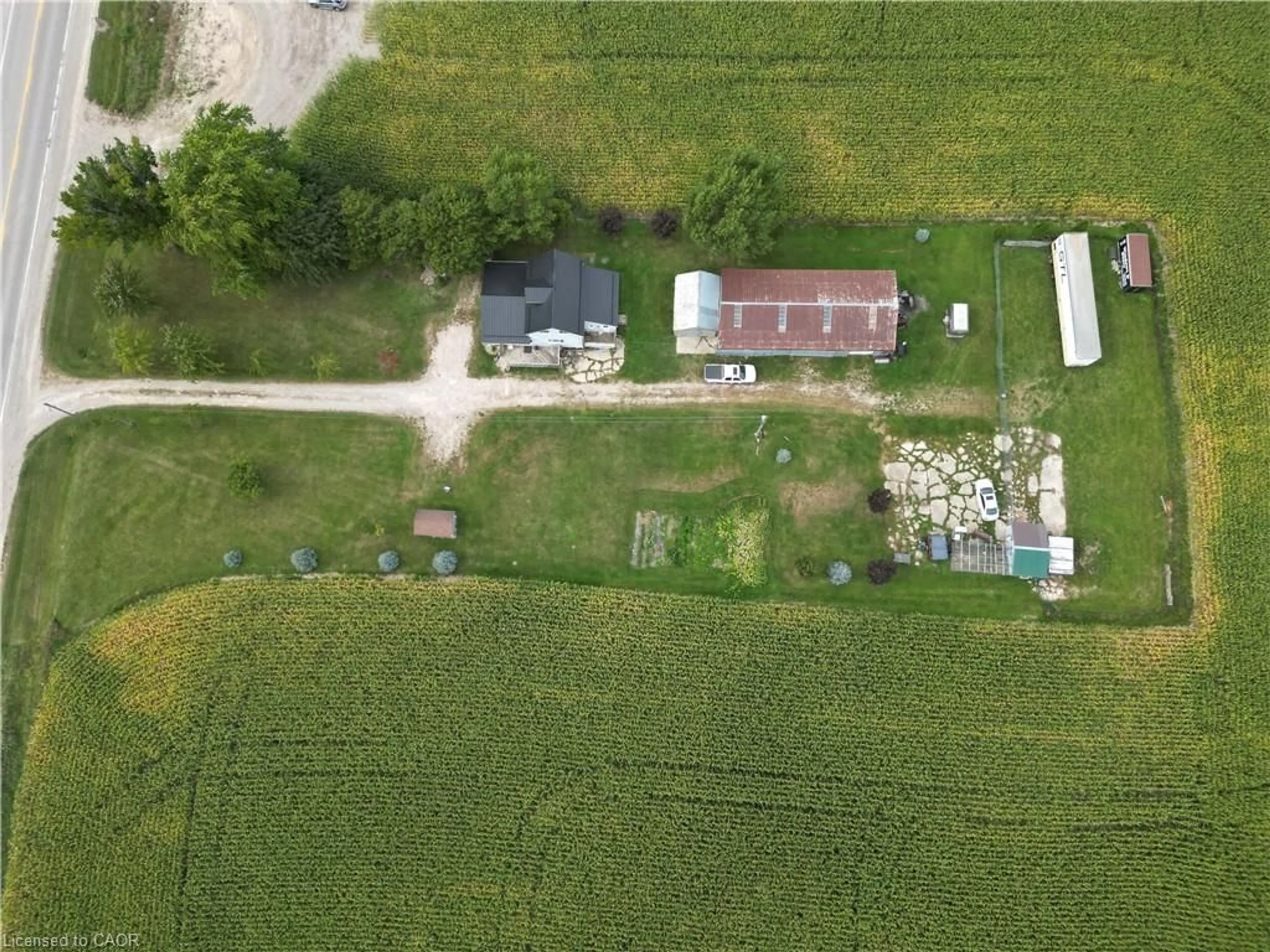 A pic from outside/outdoor area/front of a property/back of a property/a pic from drone, street for 1716 Bruce Rd 86 Rd, Lucknow Ontario N0G 2H0