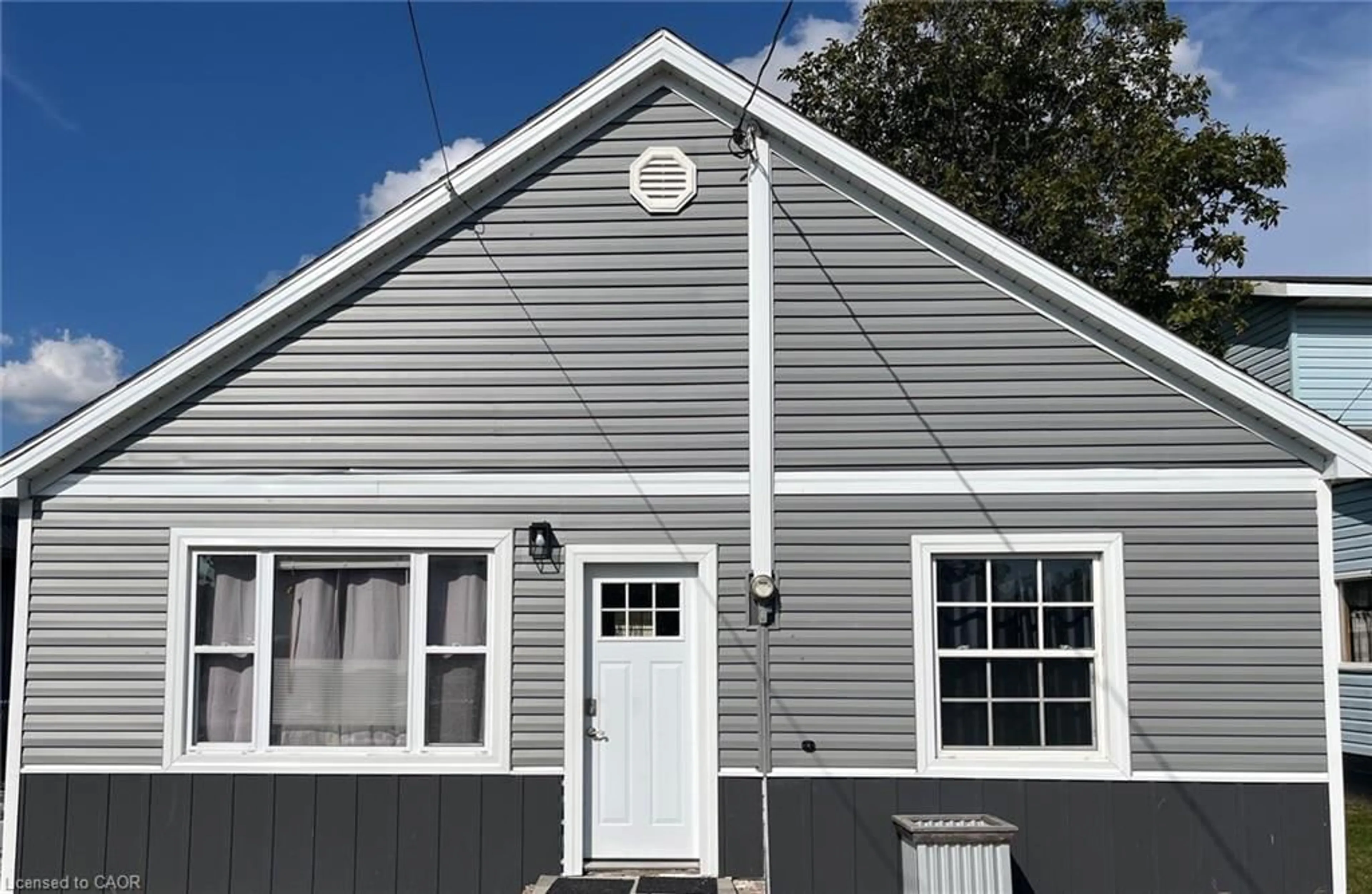 Home with vinyl exterior material, street for 18 Quarry St, Hagersville Ontario N0A 1H0