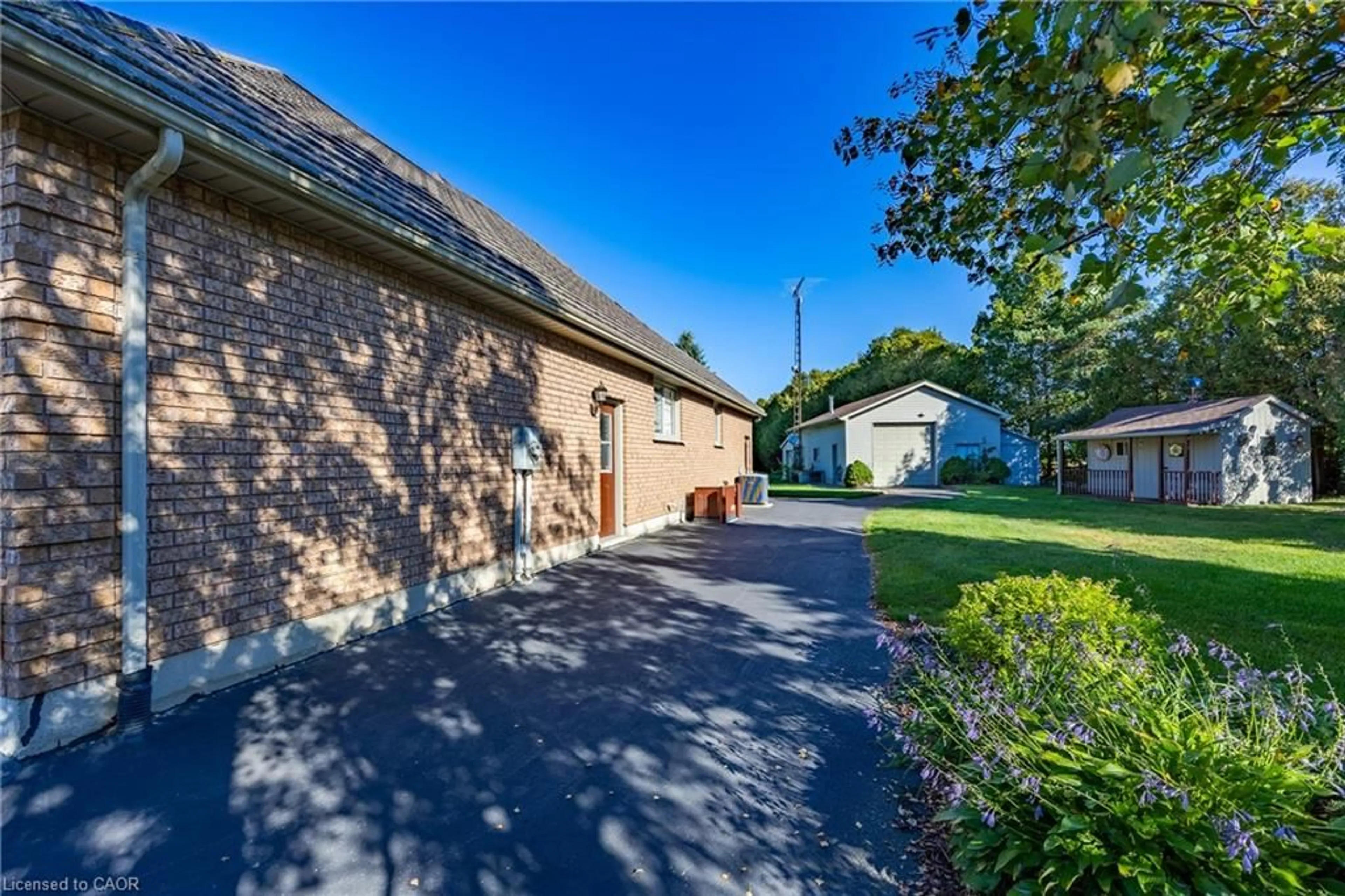 A pic from outside/outdoor area/front of a property/back of a property/a pic from drone, street for 1545 Highway 3, Delhi Ontario N4B 2W6