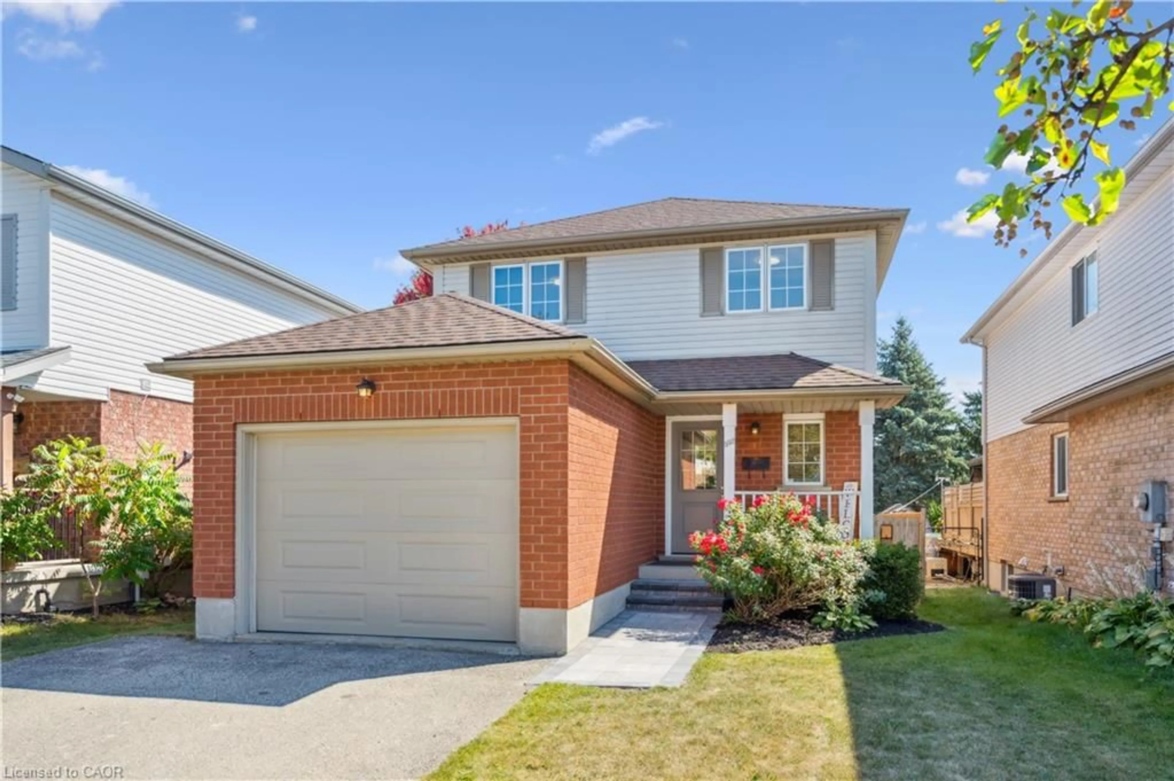 Home with brick exterior material, street for 332 Carriage House Crt, Waterloo Ontario N2K 3W8