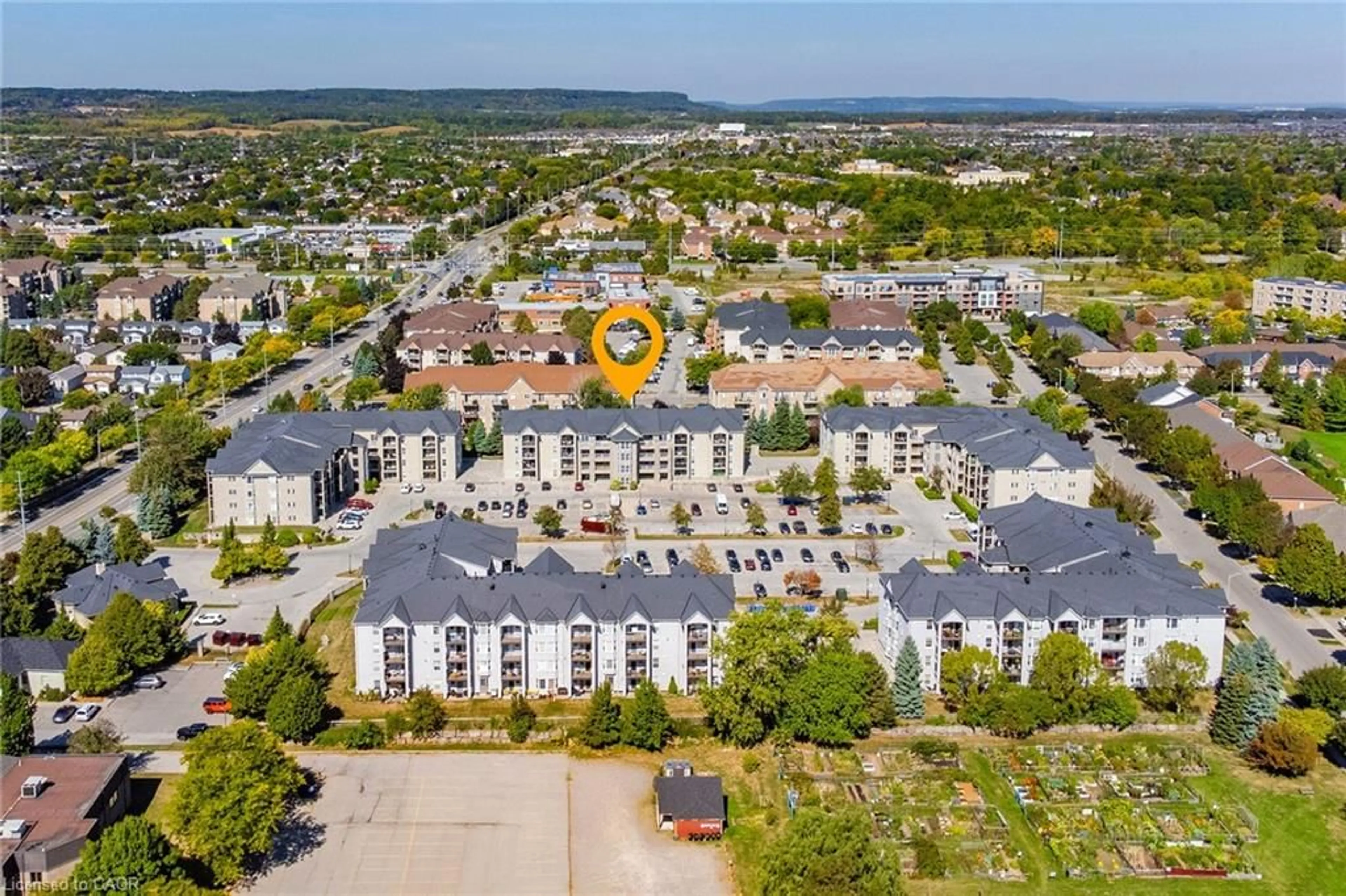 A pic from outside/outdoor area/front of a property/back of a property/a pic from drone, unknown for 1441 Walker's Line #209, Burlington Ontario L7M 4P2