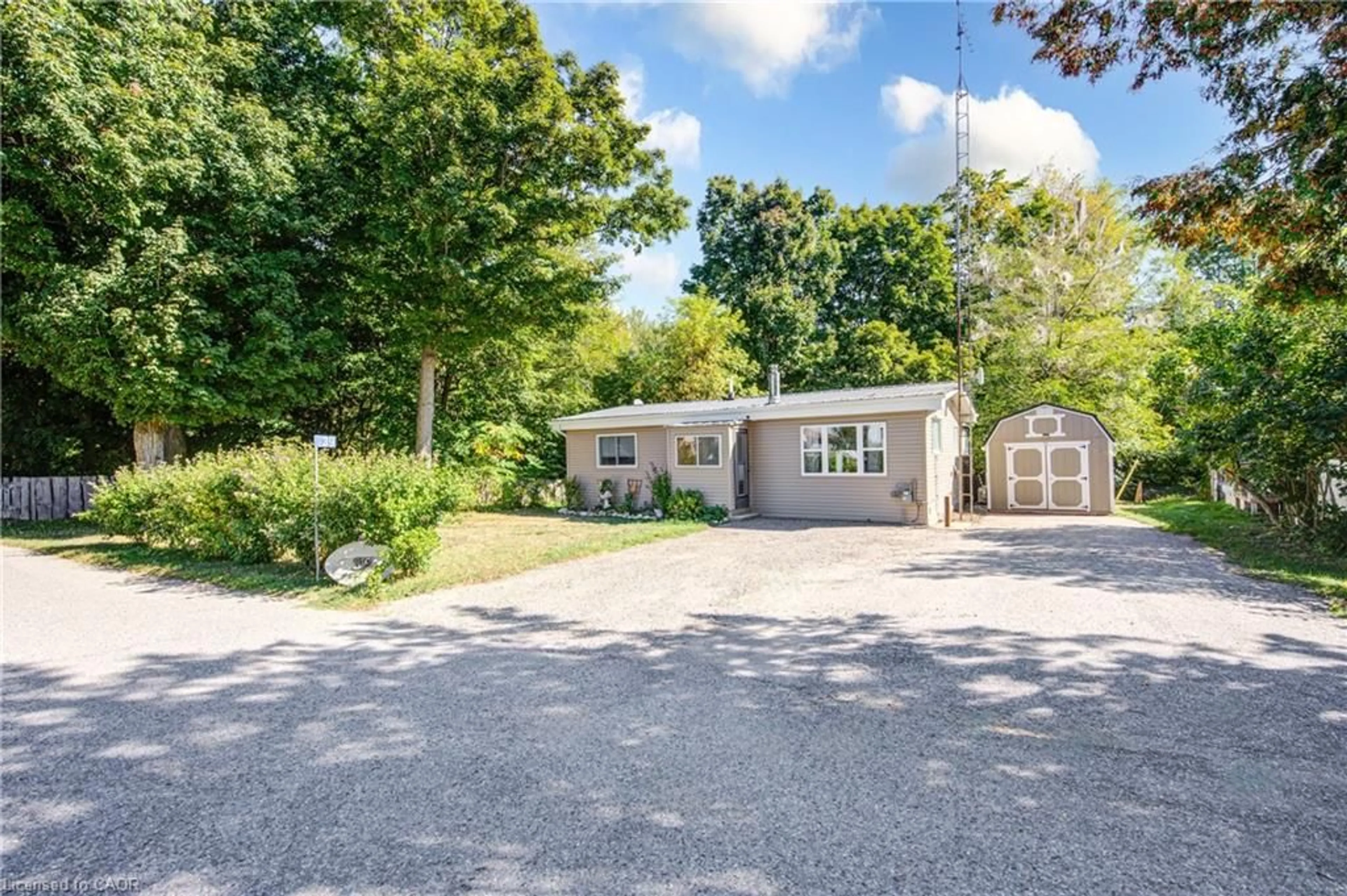 A pic from outside/outdoor area/front of a property/back of a property/a pic from drone, street for 29 Oxford Rd #39, Innerkip Ontario N0J 1M0