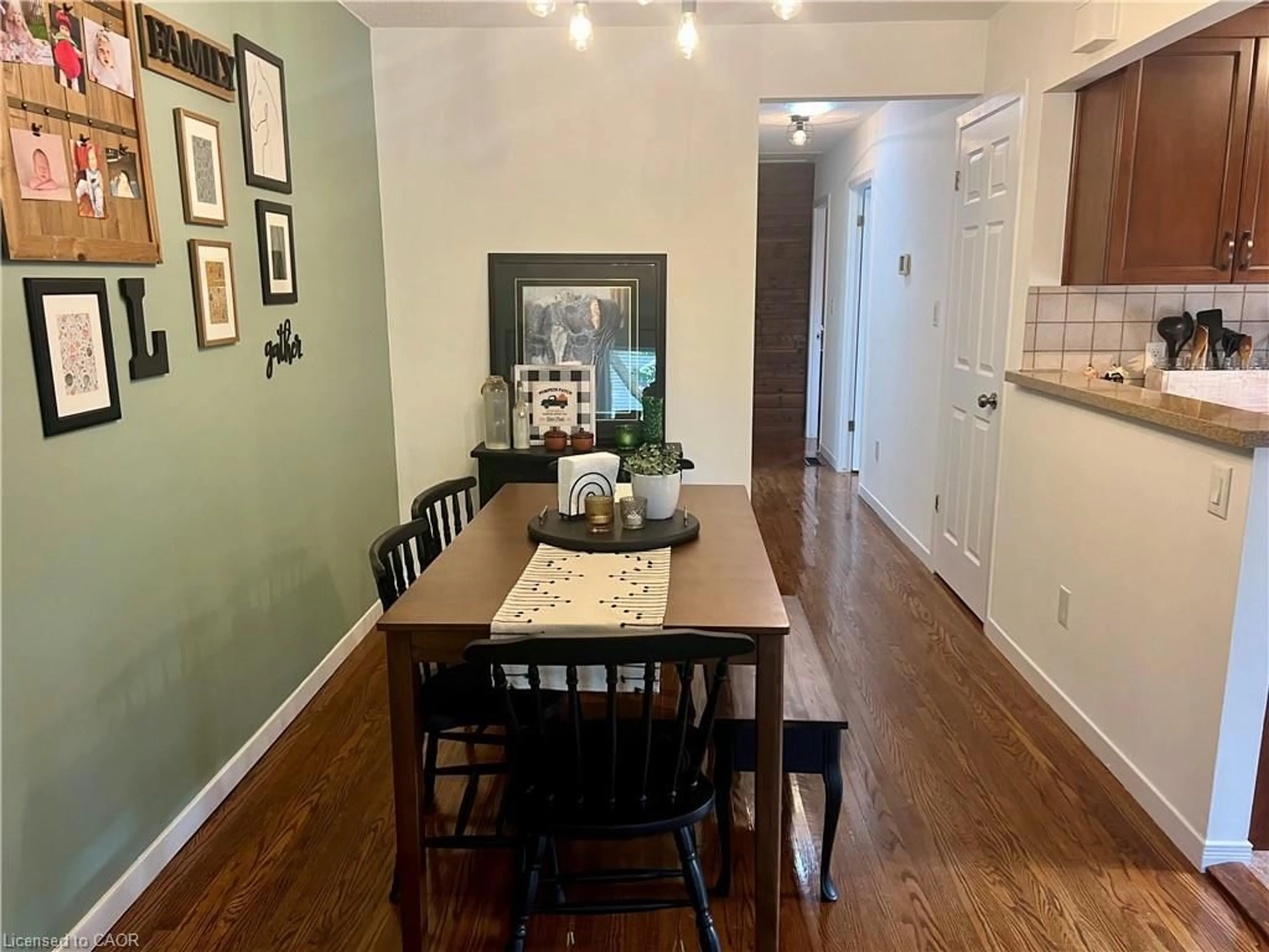 Dining room, wood/laminate floor for 42 Seymour Ave, St. Catharines Ontario L2P 1A7