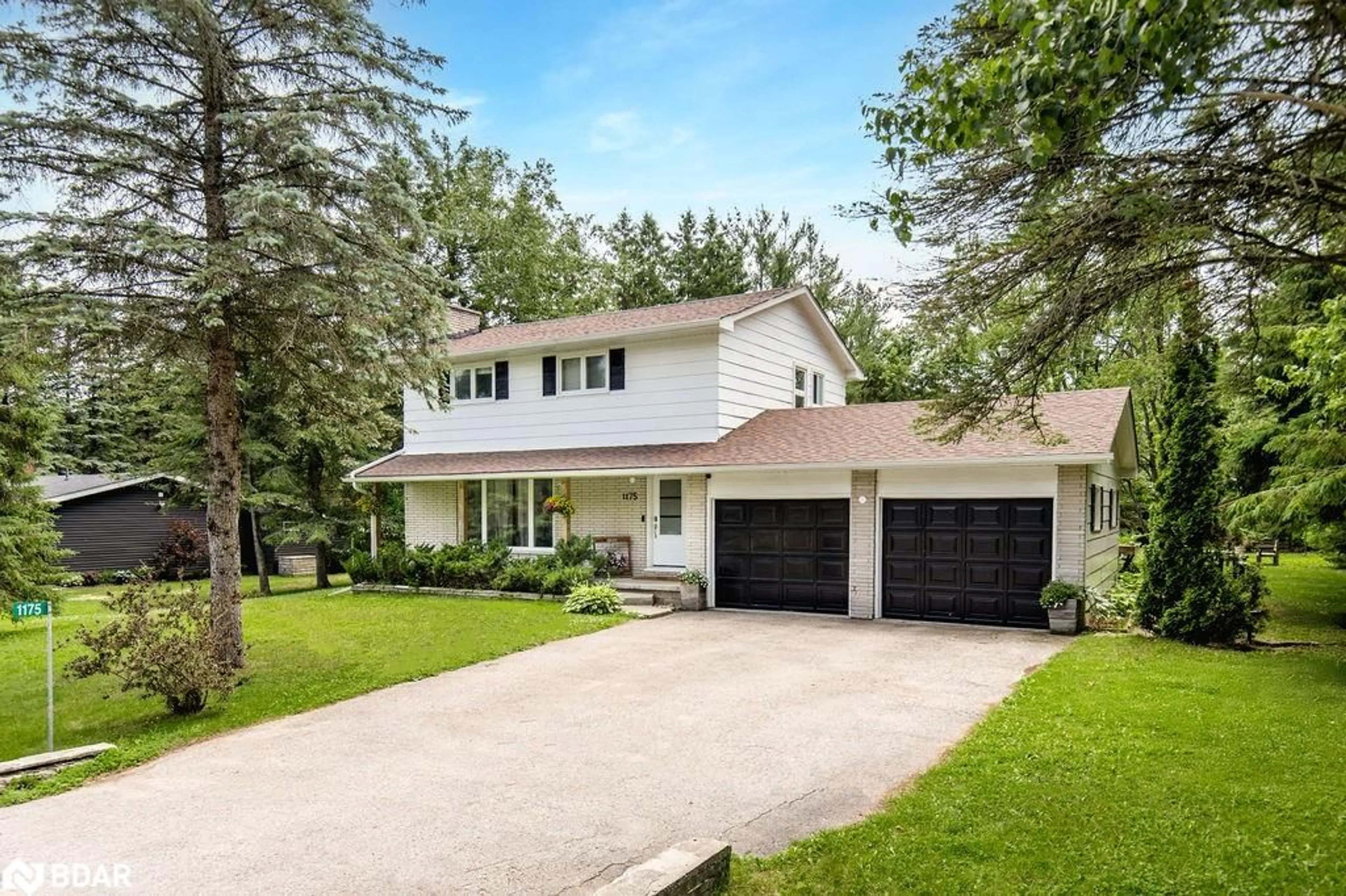 Home with vinyl exterior material, street for 1175 Carson Rd, Springwater Ontario L9X 0T7