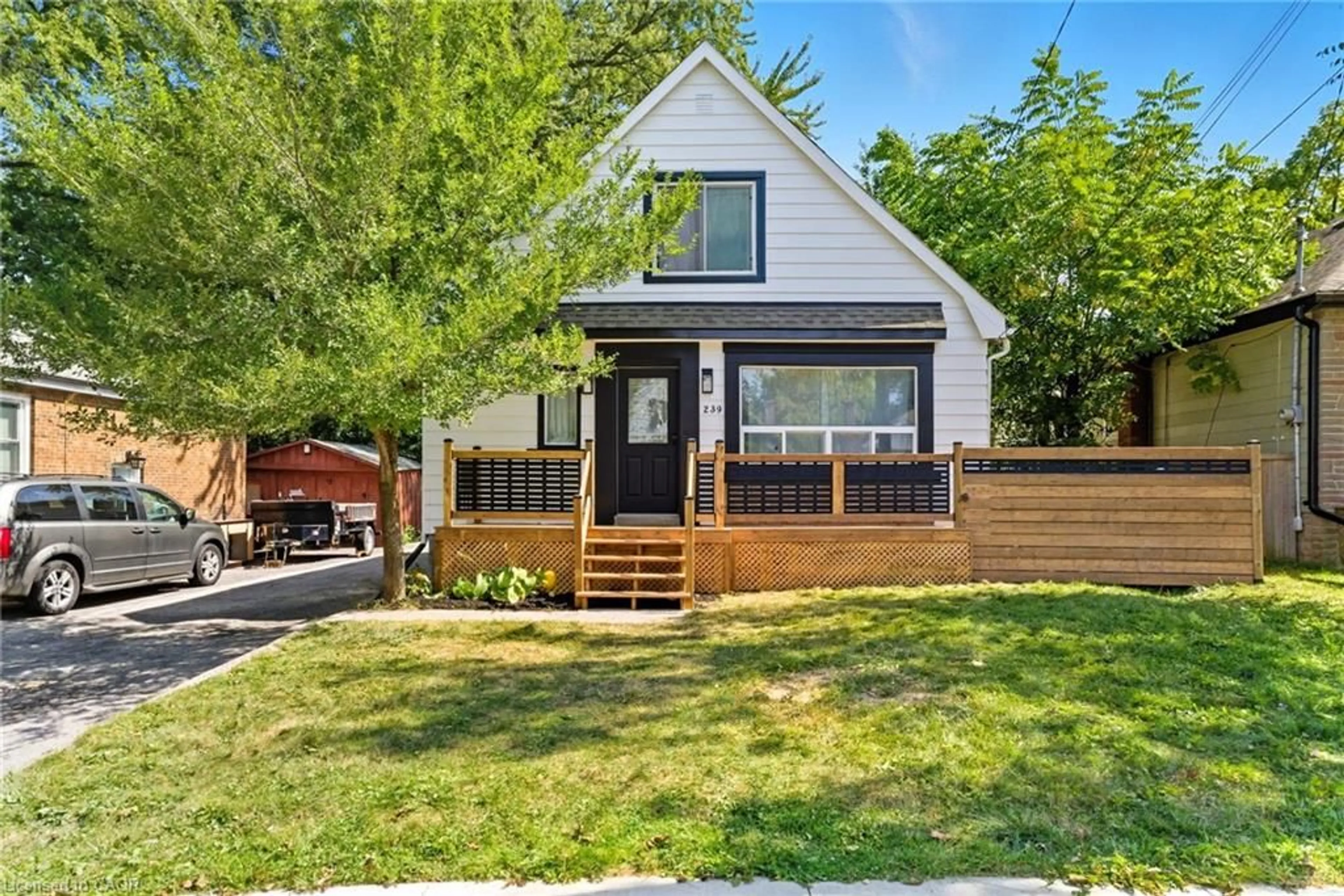Home with vinyl exterior material, street for 239 East 22nd St, Hamilton Ontario L8V 2V8