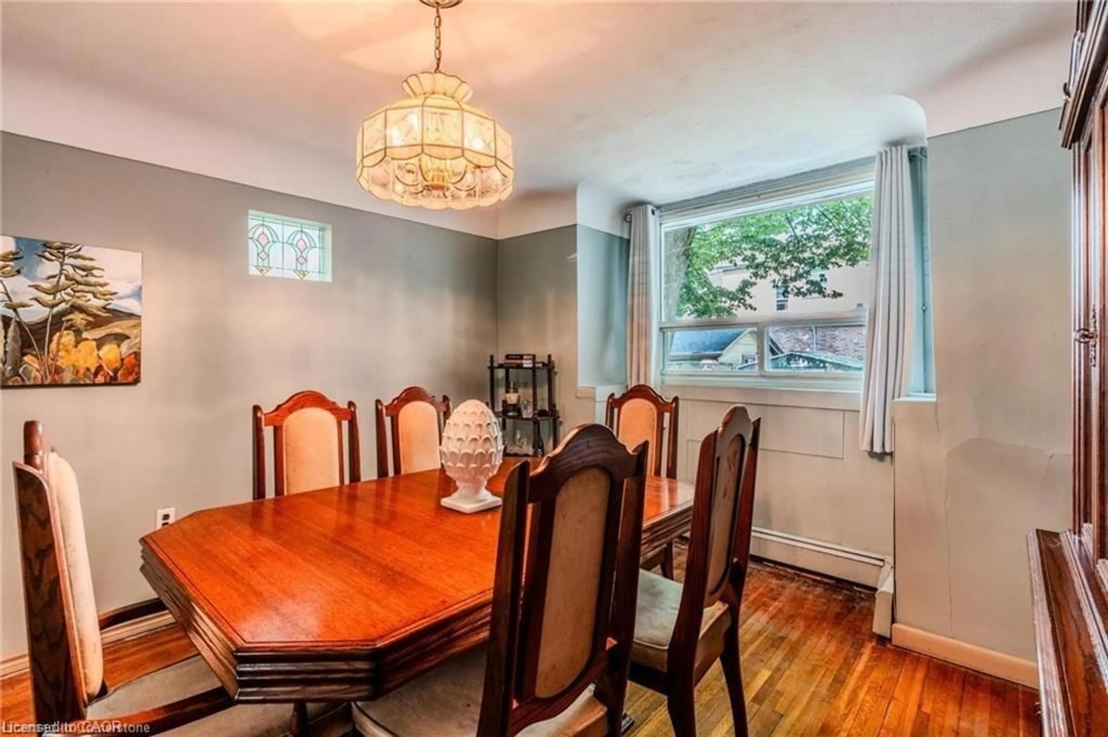 Dining room, wood/laminate floor for 95 Paradise Rd, Hamilton Ontario L8S 3S9