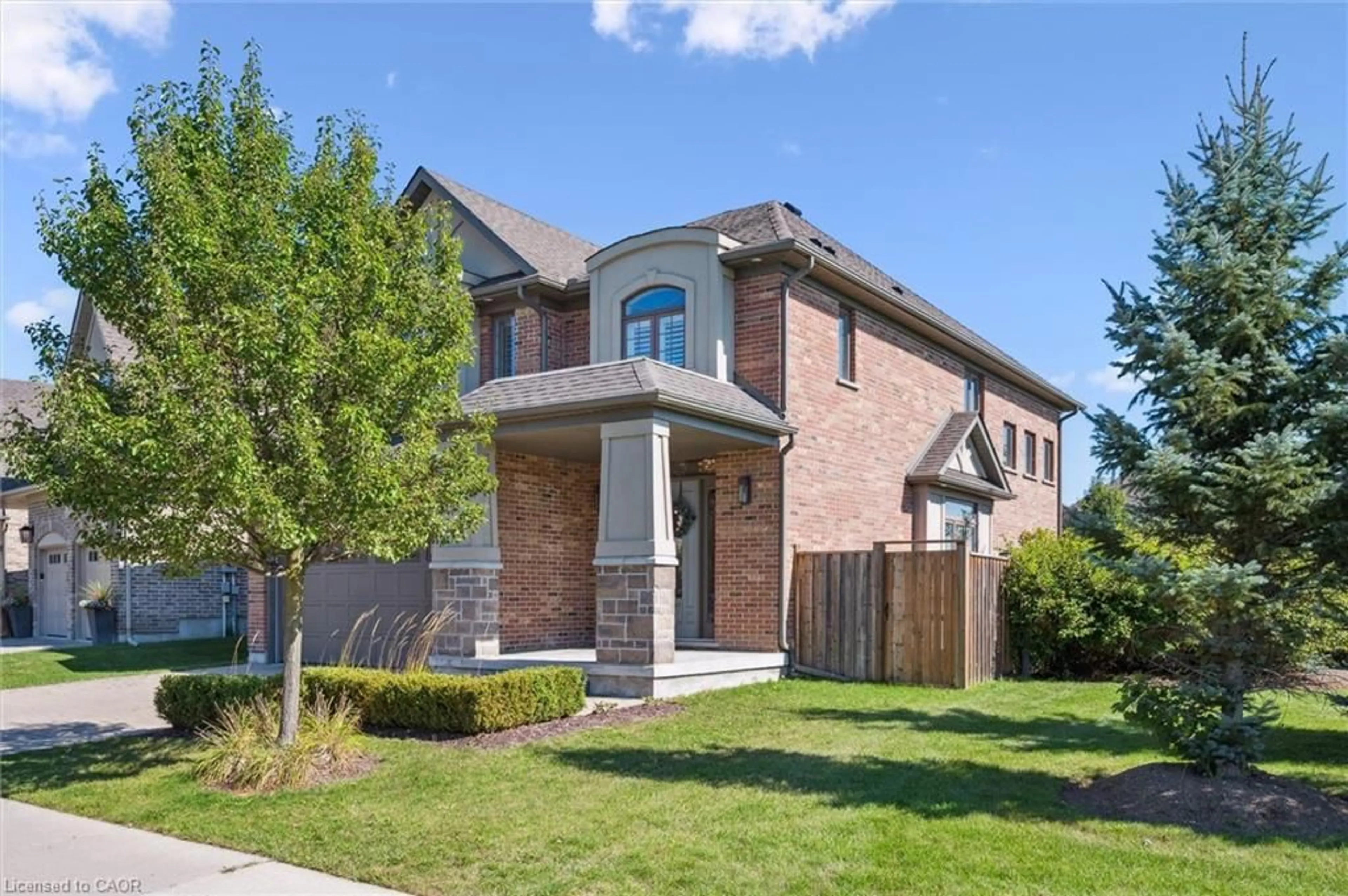 Home with brick exterior material, street for 302 Grey Silo Rd, Waterloo Ontario N2K 0C9