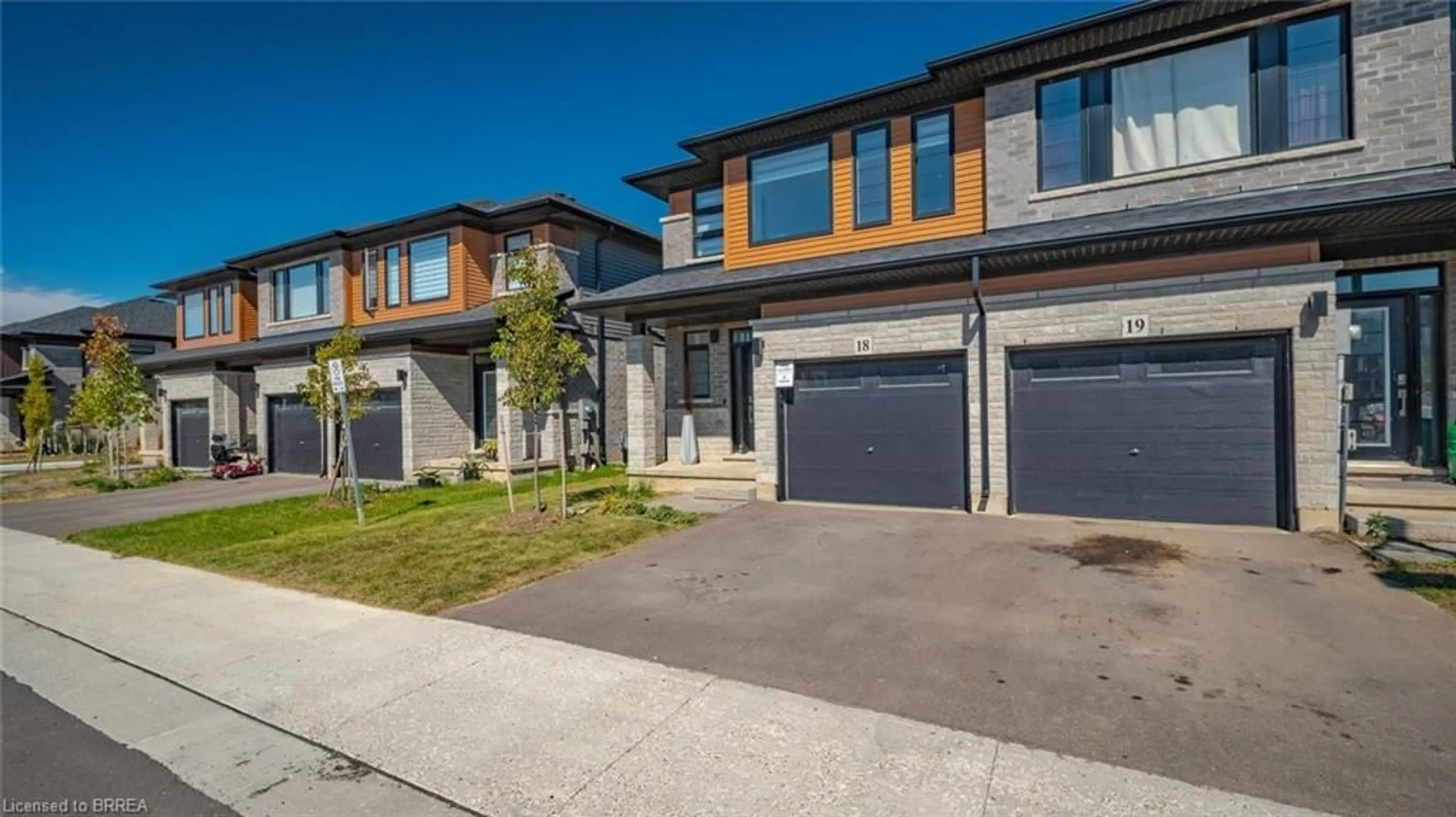 Home with brick exterior material, street for 461 Blackburn Dr #18, Brantford Ontario N3T 0W9