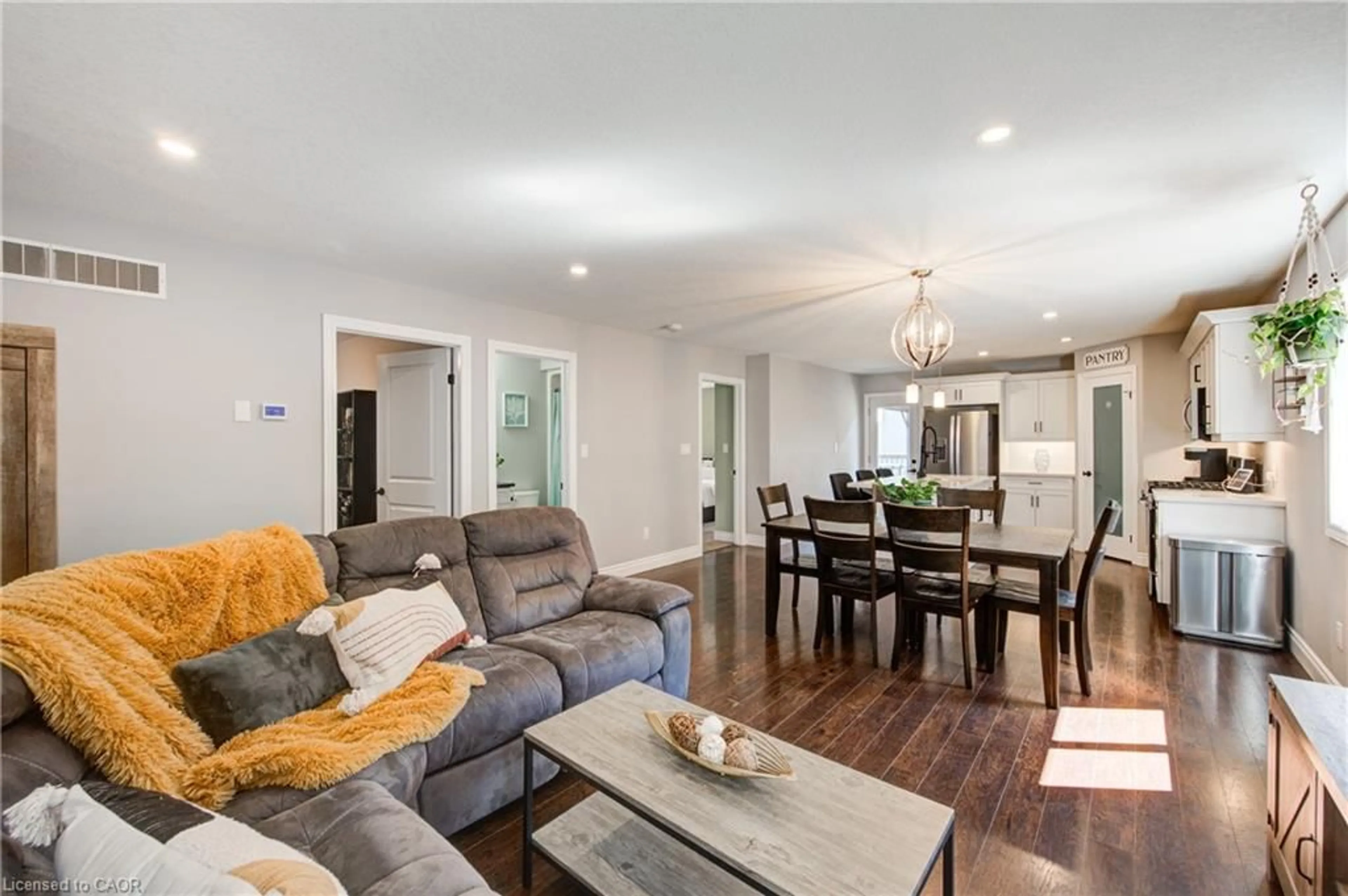 Living room with furniture, wood/laminate floor for 14 Reeves Road Rd, Ingersoll Ontario N5C 0E1