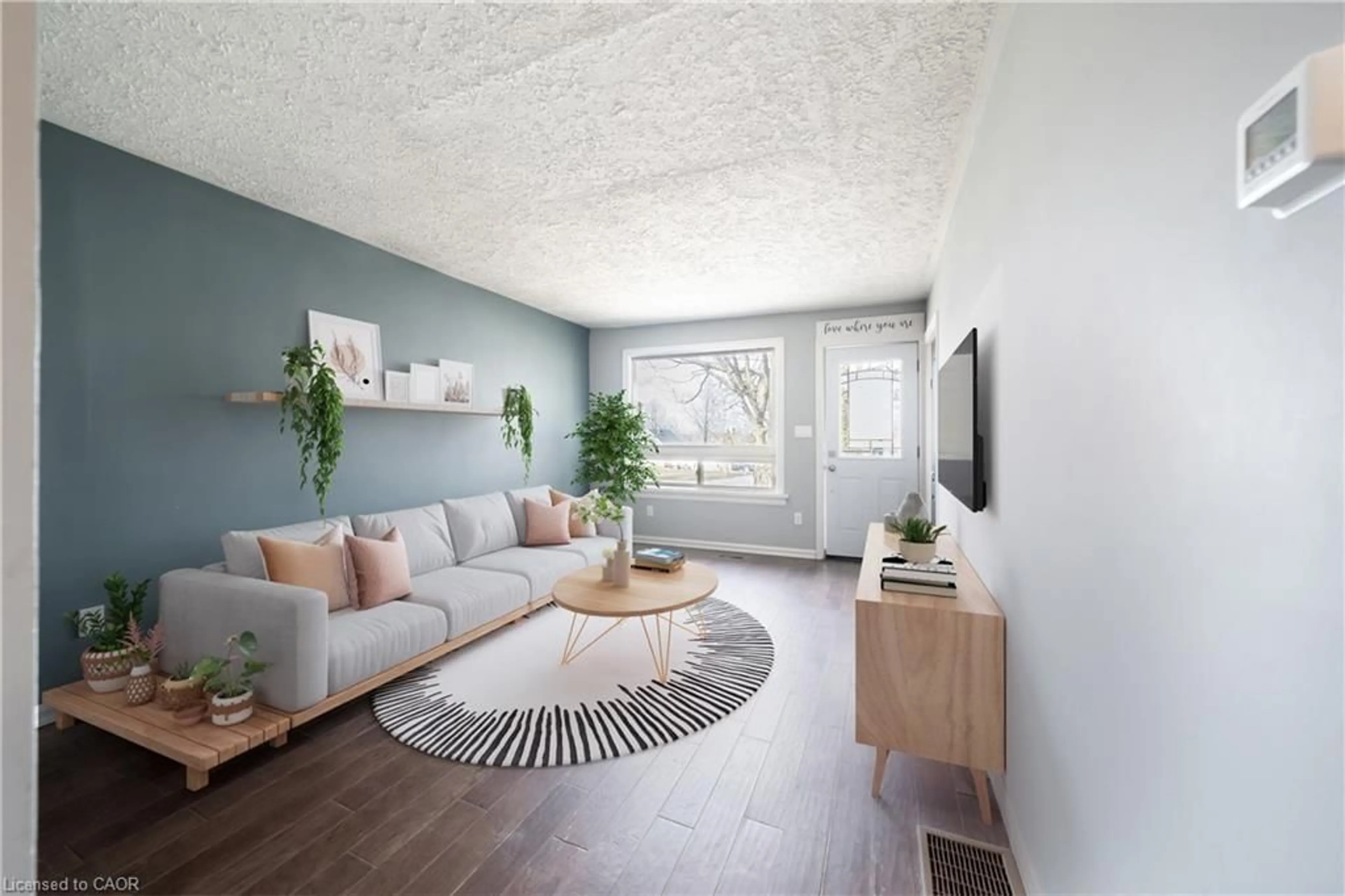 Living room with furniture, unknown for 21 Renfrew St, Caledonia Ontario N3W 1E8