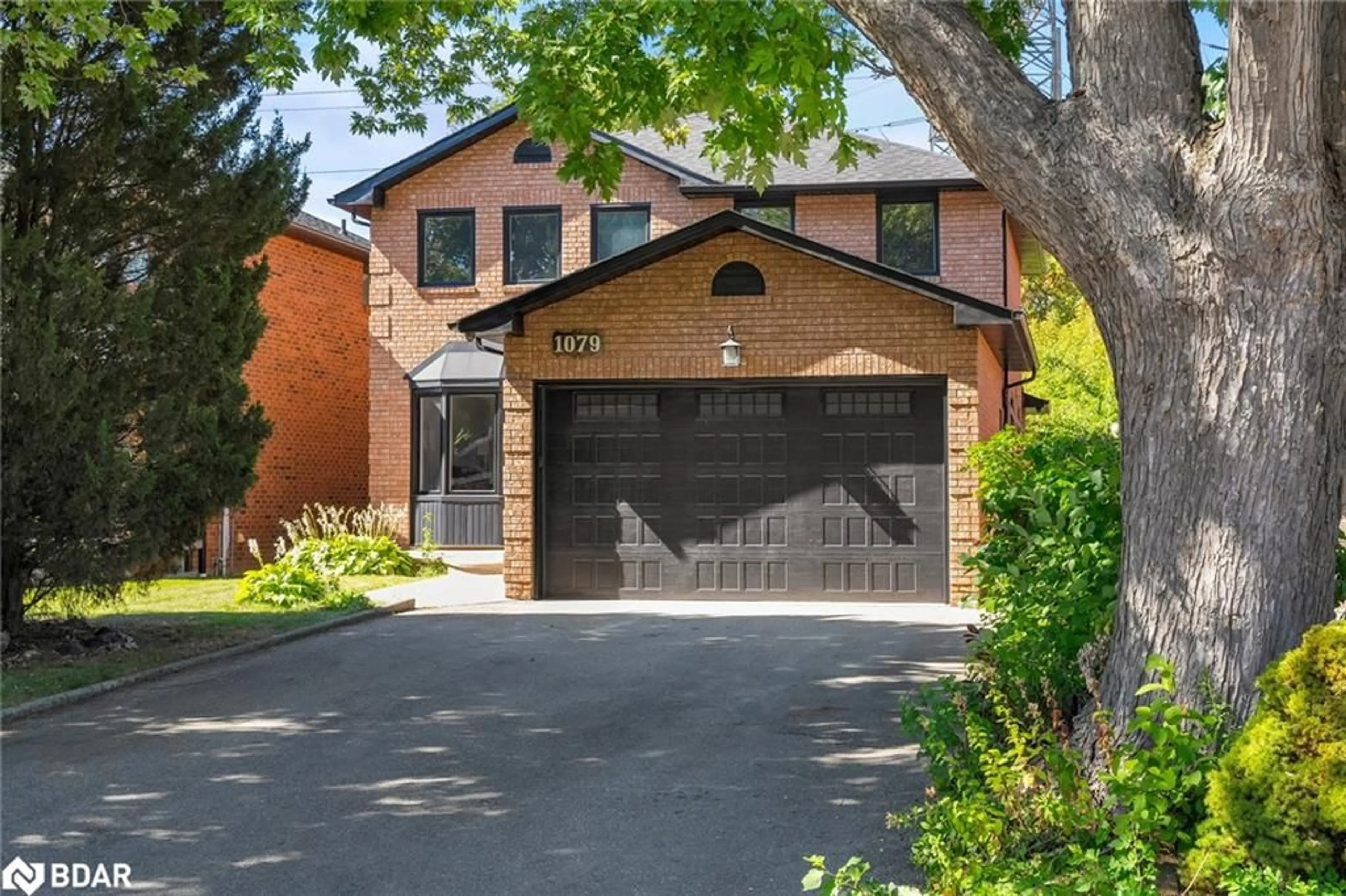 Home with brick exterior material, street for 1079 Hedge Dr, Mississauga Ontario L4Y 1G3