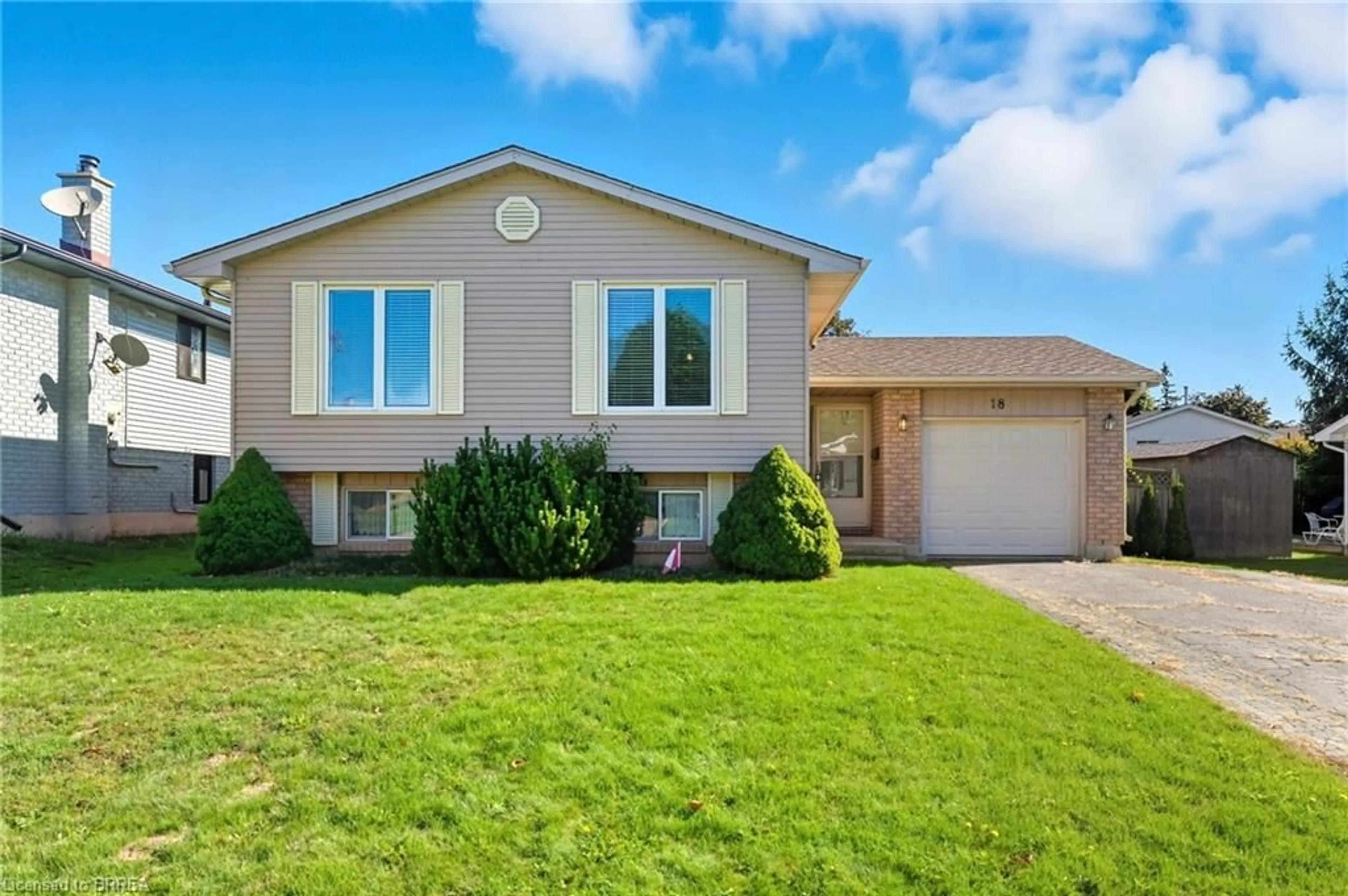 Home with vinyl exterior material, street for 18 Scott St, St. George Ontario N0E 1N0