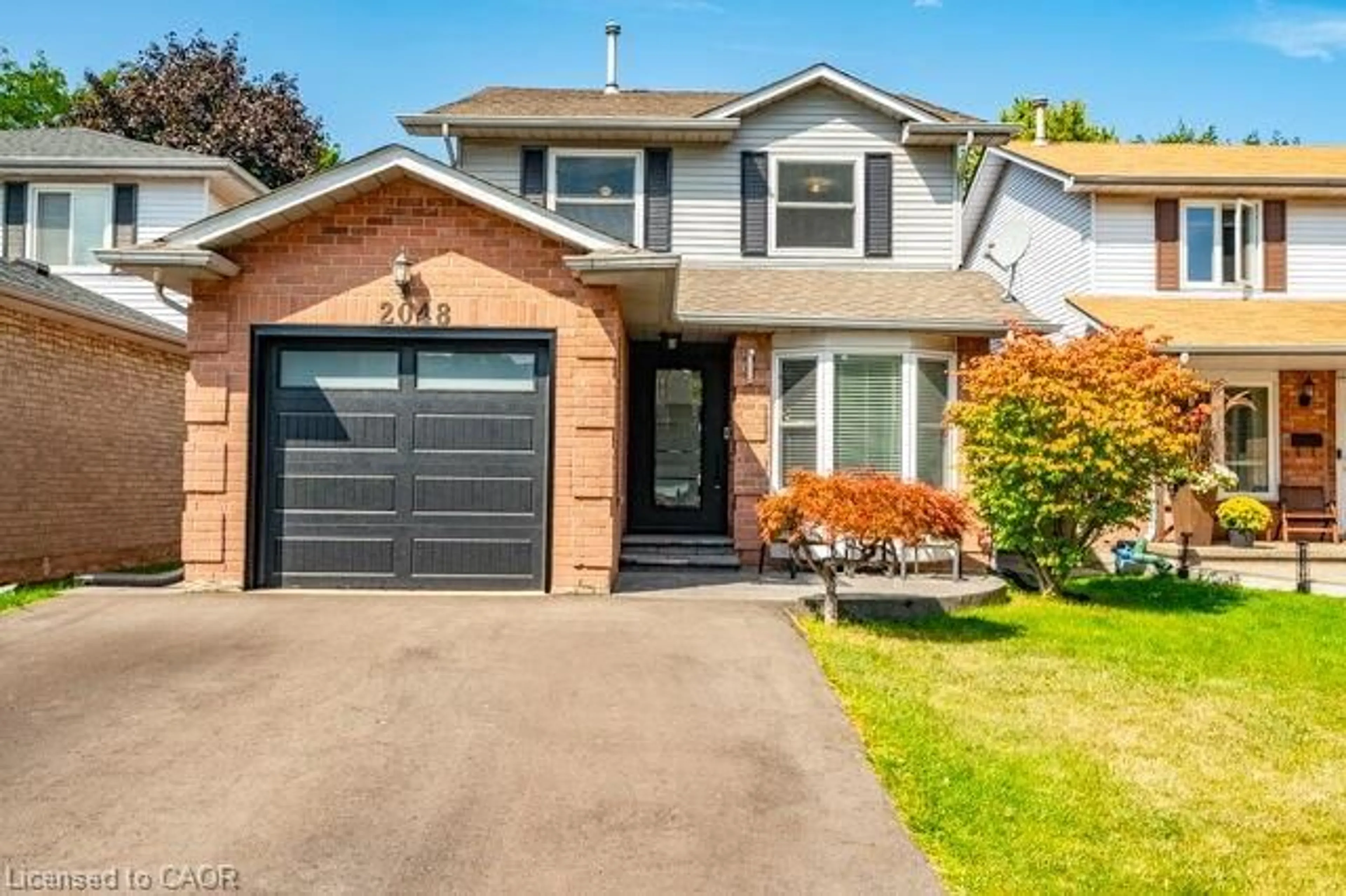Home with brick exterior material, street for 2048 Chrisdon Rd, Burlington Ontario L7M 3W9