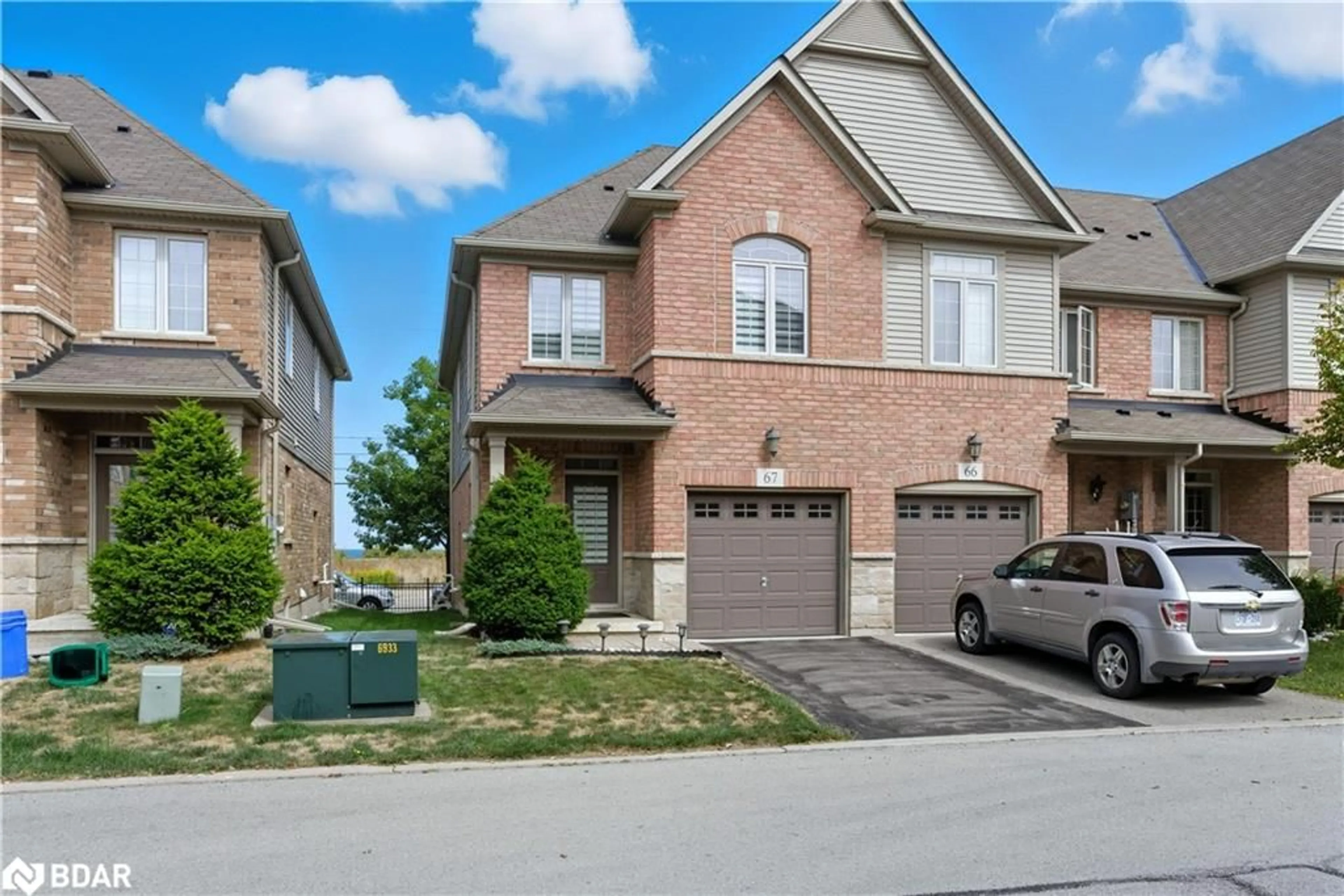 Home with brick exterior material, street for 515 Winston Road Rd #67, Grimsby Ontario L3M 4E8