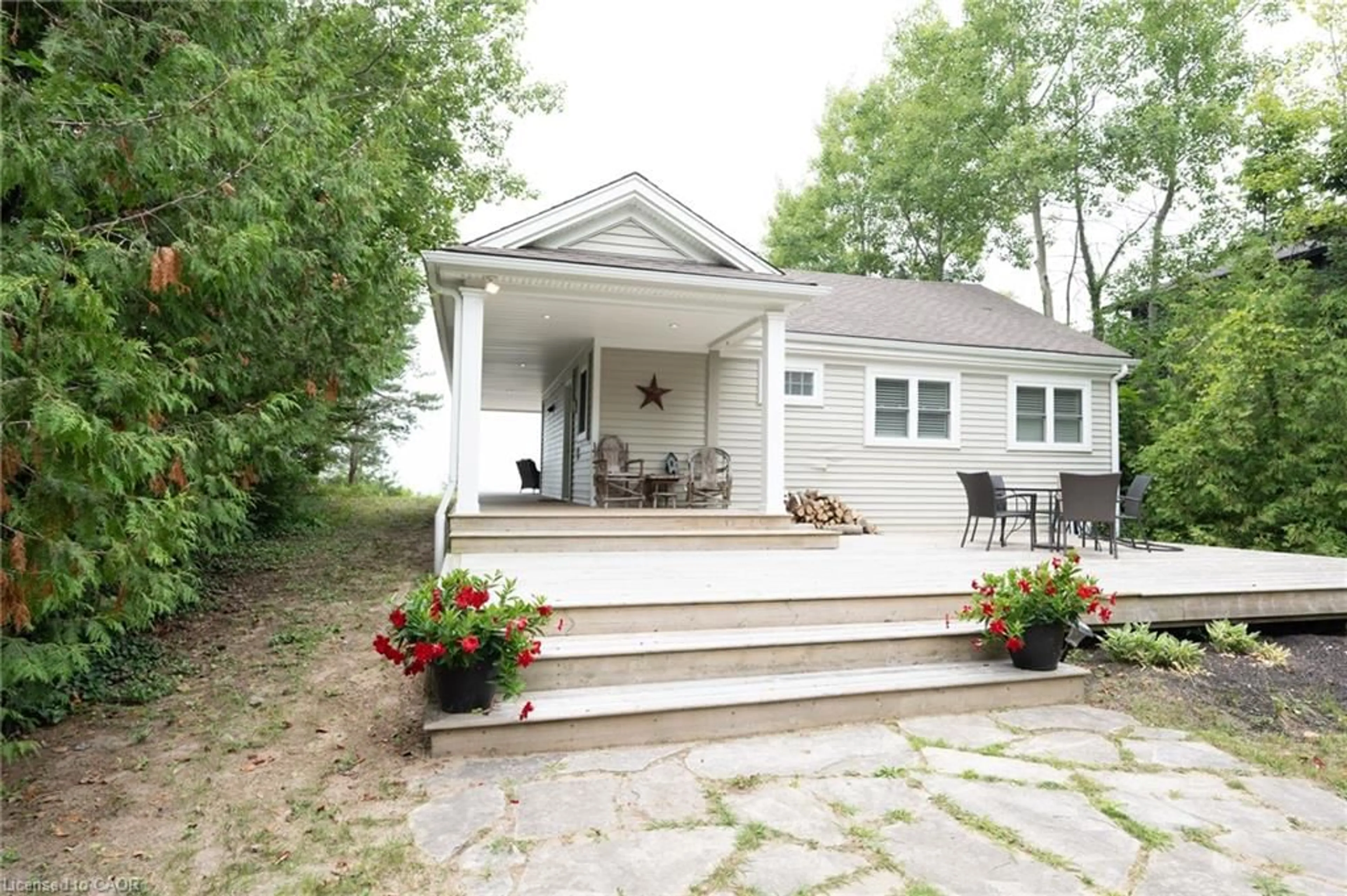 Home with vinyl exterior material, street for 86647 Amberley Beach Rd, Amberley Ontario N7A 3Y4
