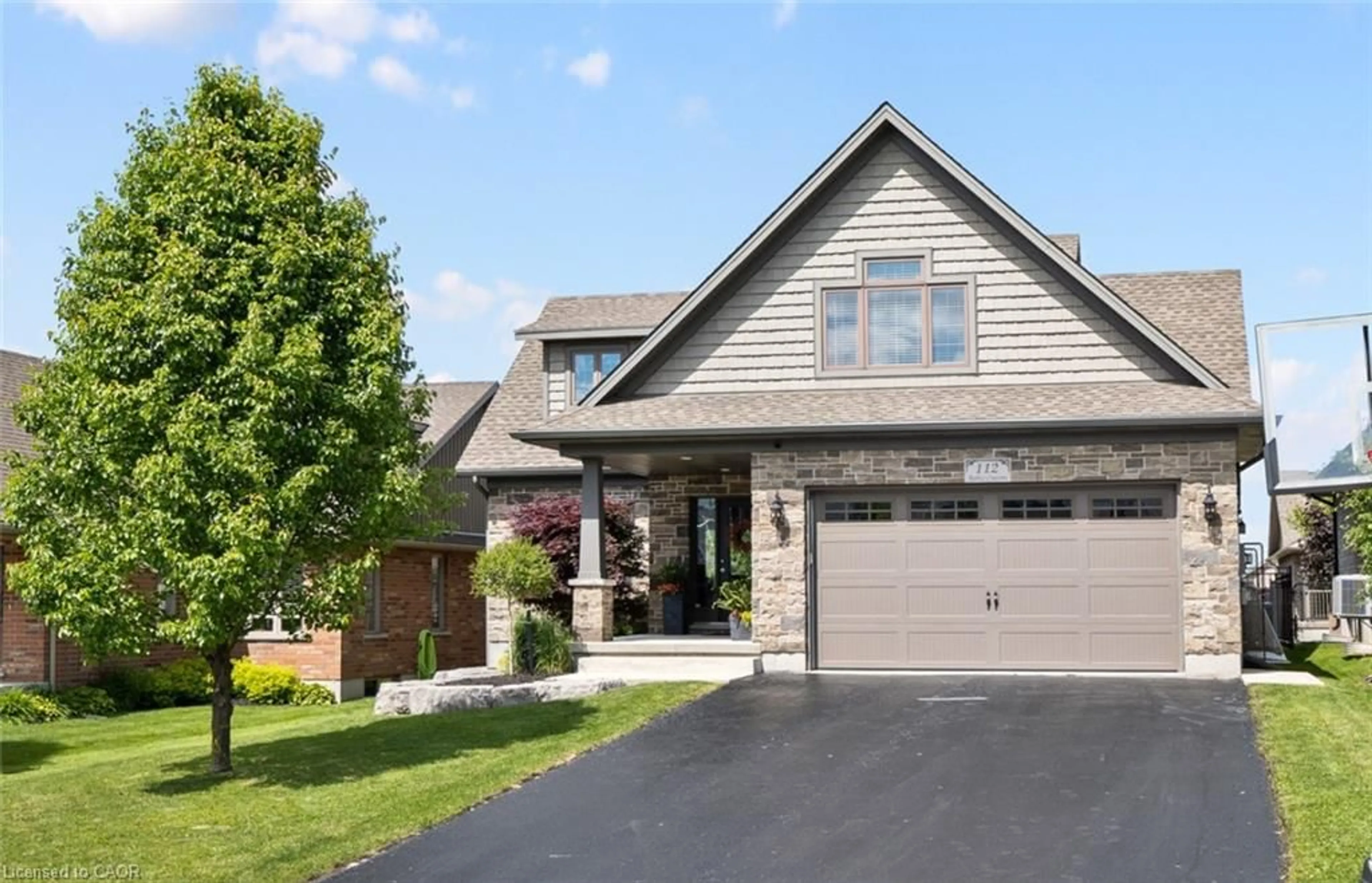 Home with brick exterior material, street for 112 Ruby's Cres, Mount Forest Ontario N0G 2L2