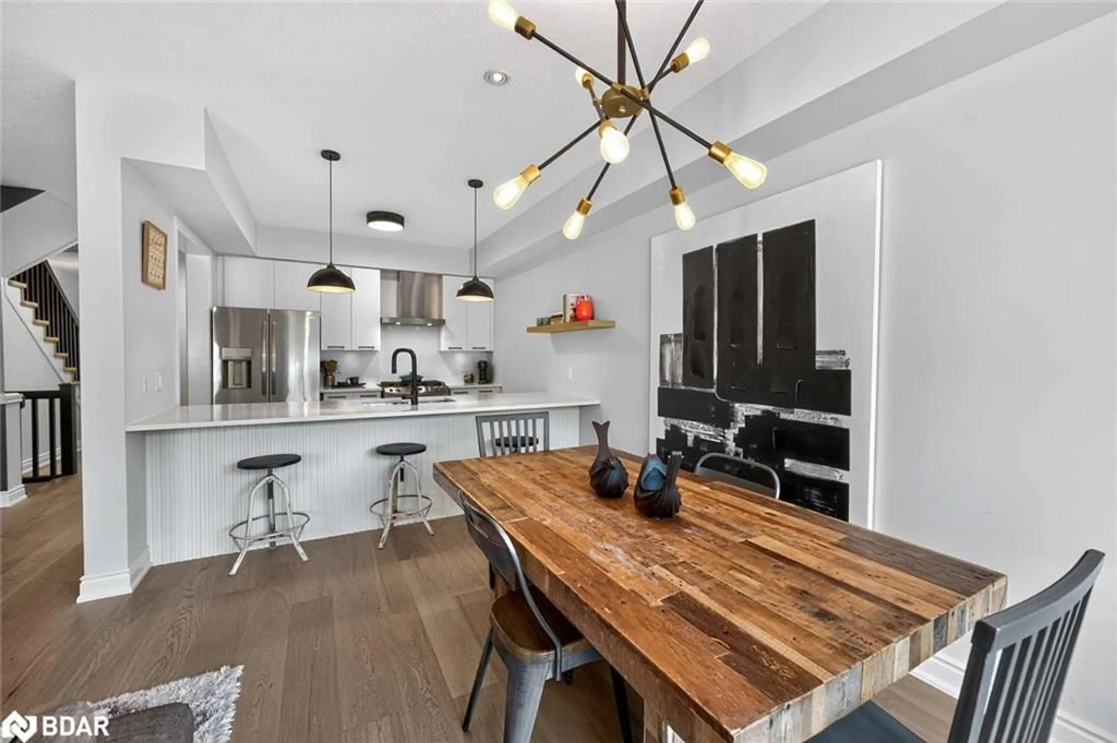 Open concept kitchen, wood/laminate floor for 1491 Plains St, Burlington Ontario L7T 4H1