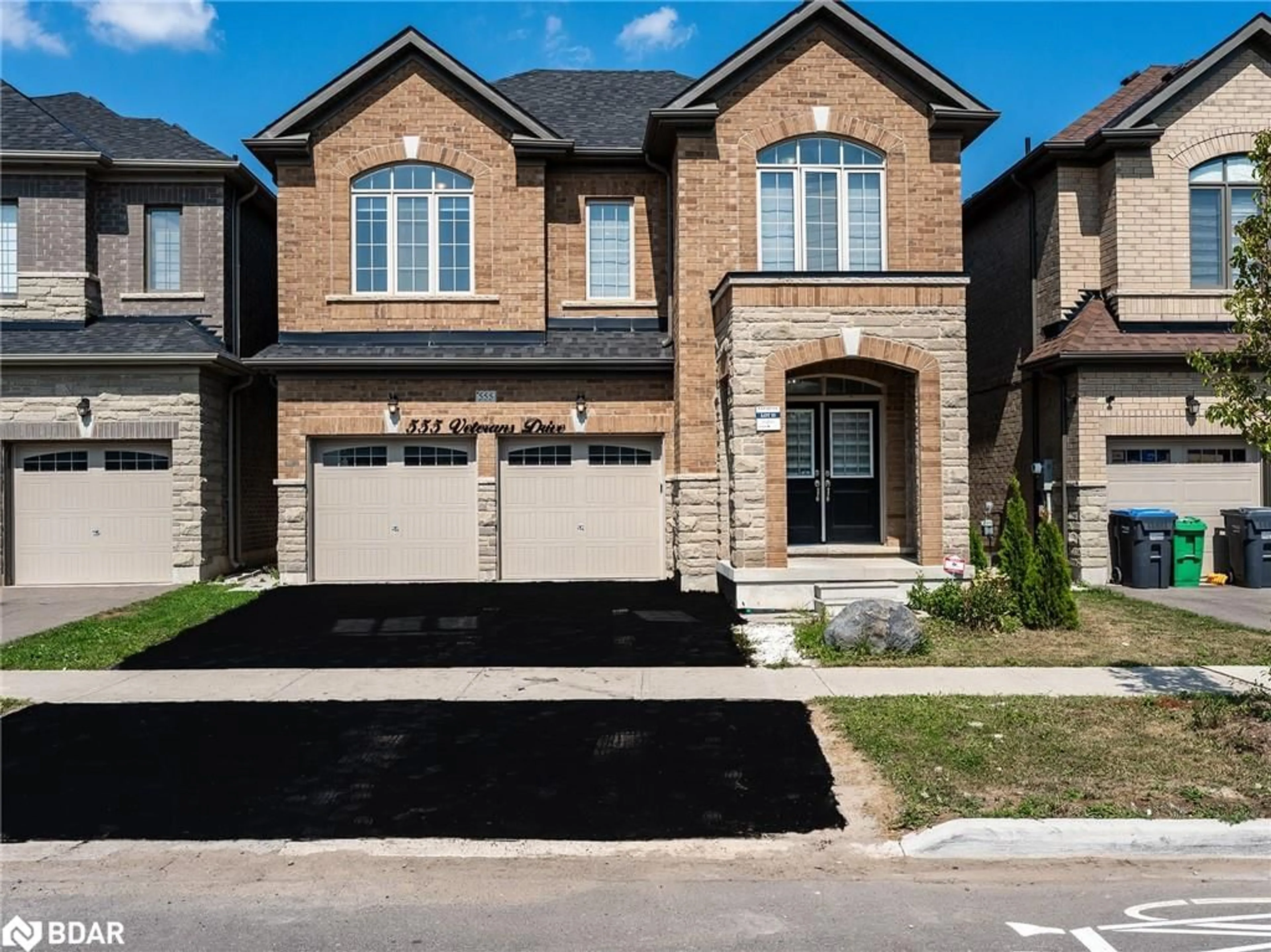 Home with brick exterior material, street for 555 Veterans Drive Dr, Brampton Ontario L7A 5A6