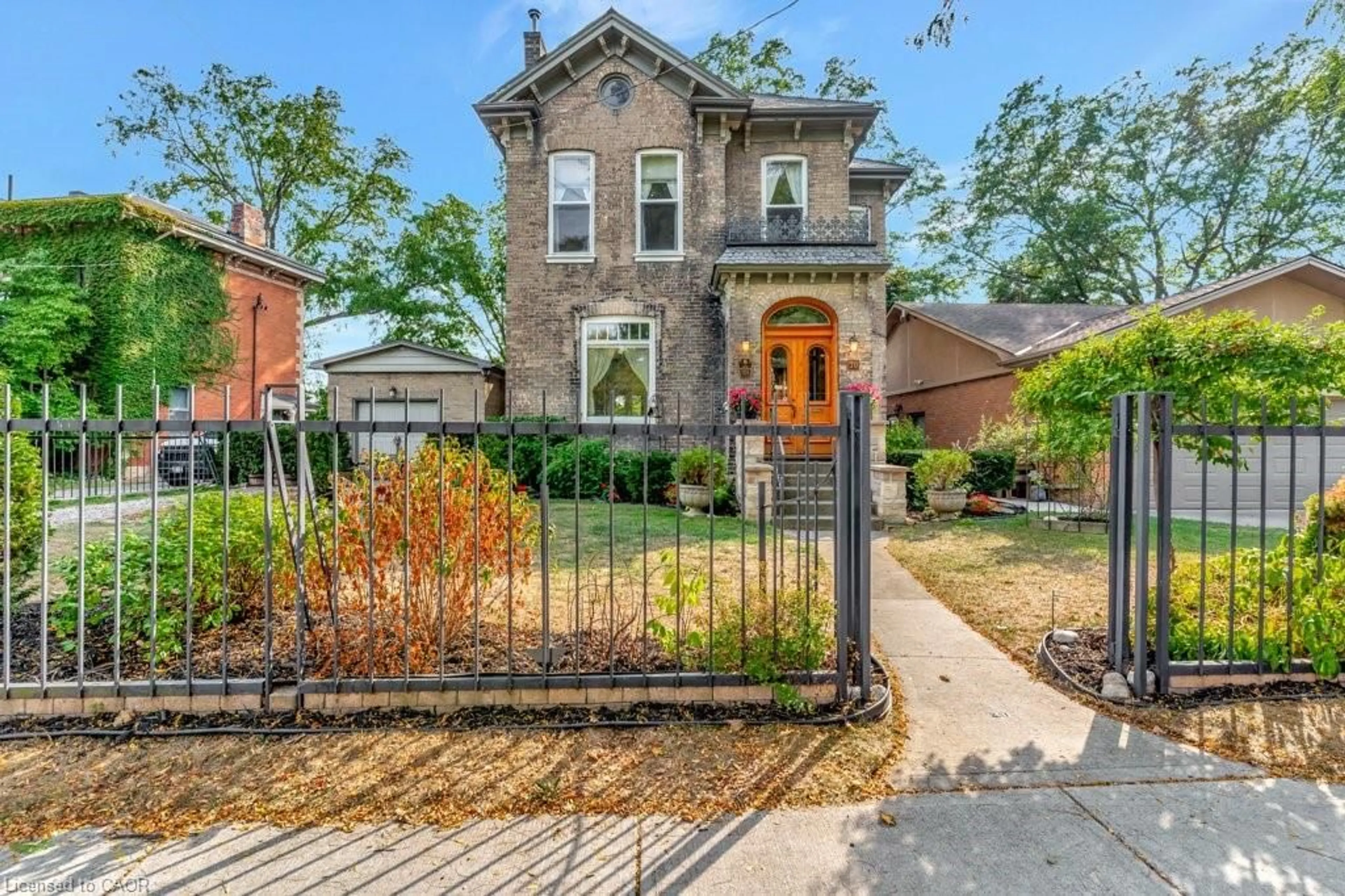 Home with brick exterior material, street for 30 Lorne Cres, Brantford Ontario N3T 4L7