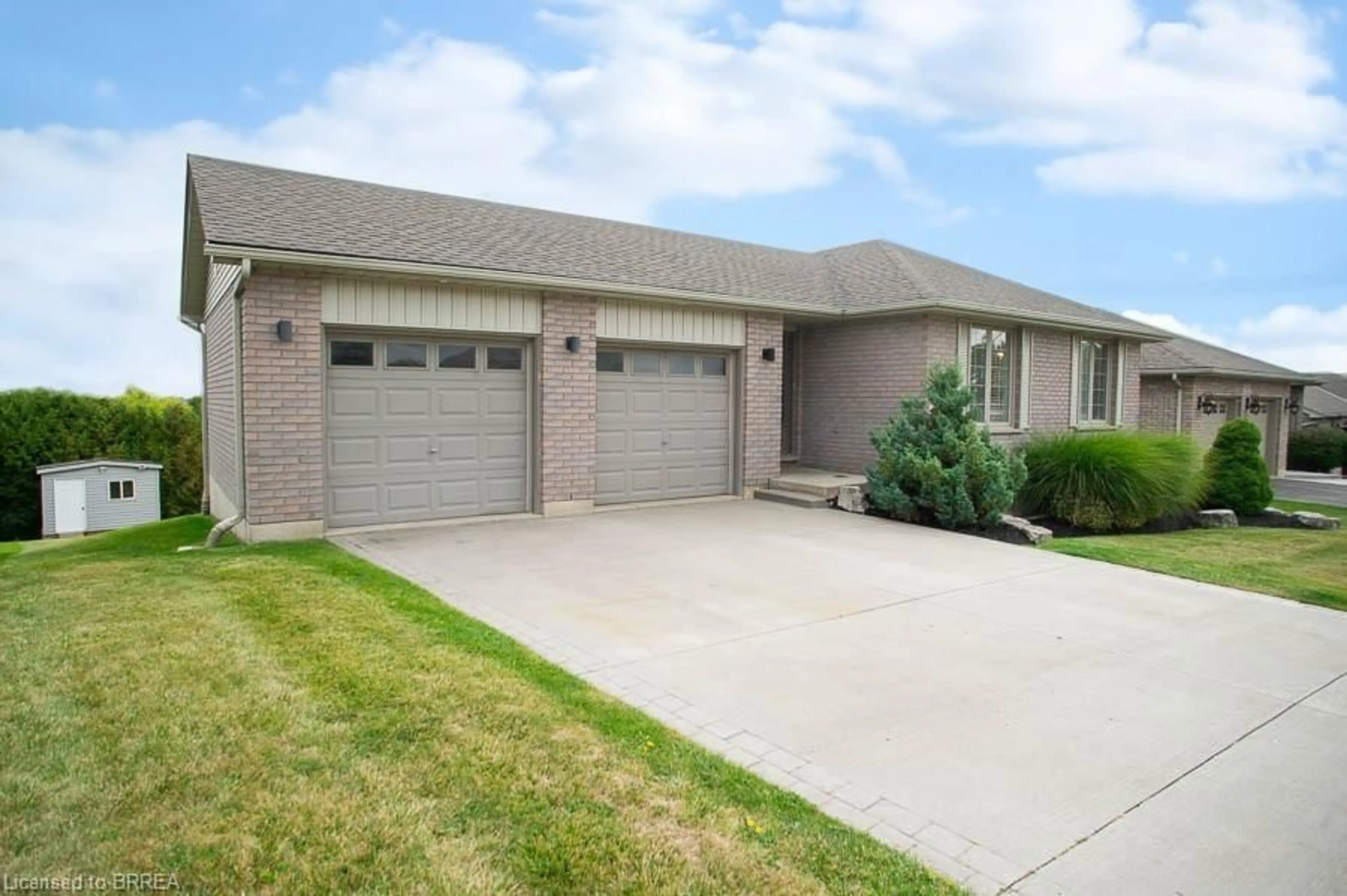 Home with brick exterior material, street for 52 Sunnyside Dr, St. George Ontario N0E 1N0