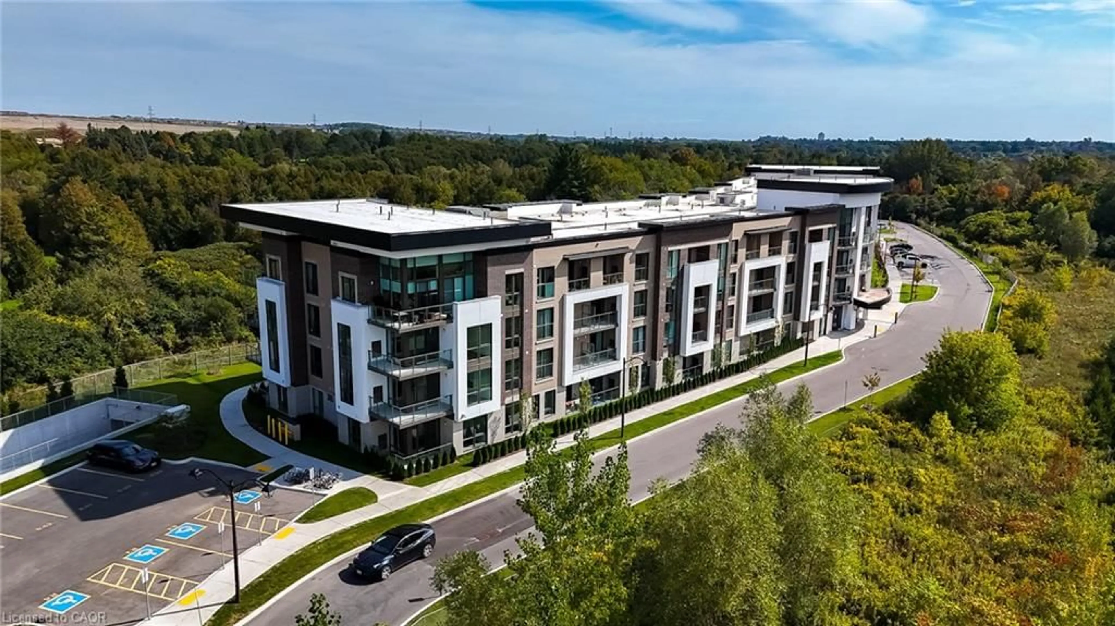A pic from outside/outdoor area/front of a property/back of a property/a pic from drone, building for 385 Artic Red Dr #418, Oshawa Ontario L1L 0W9