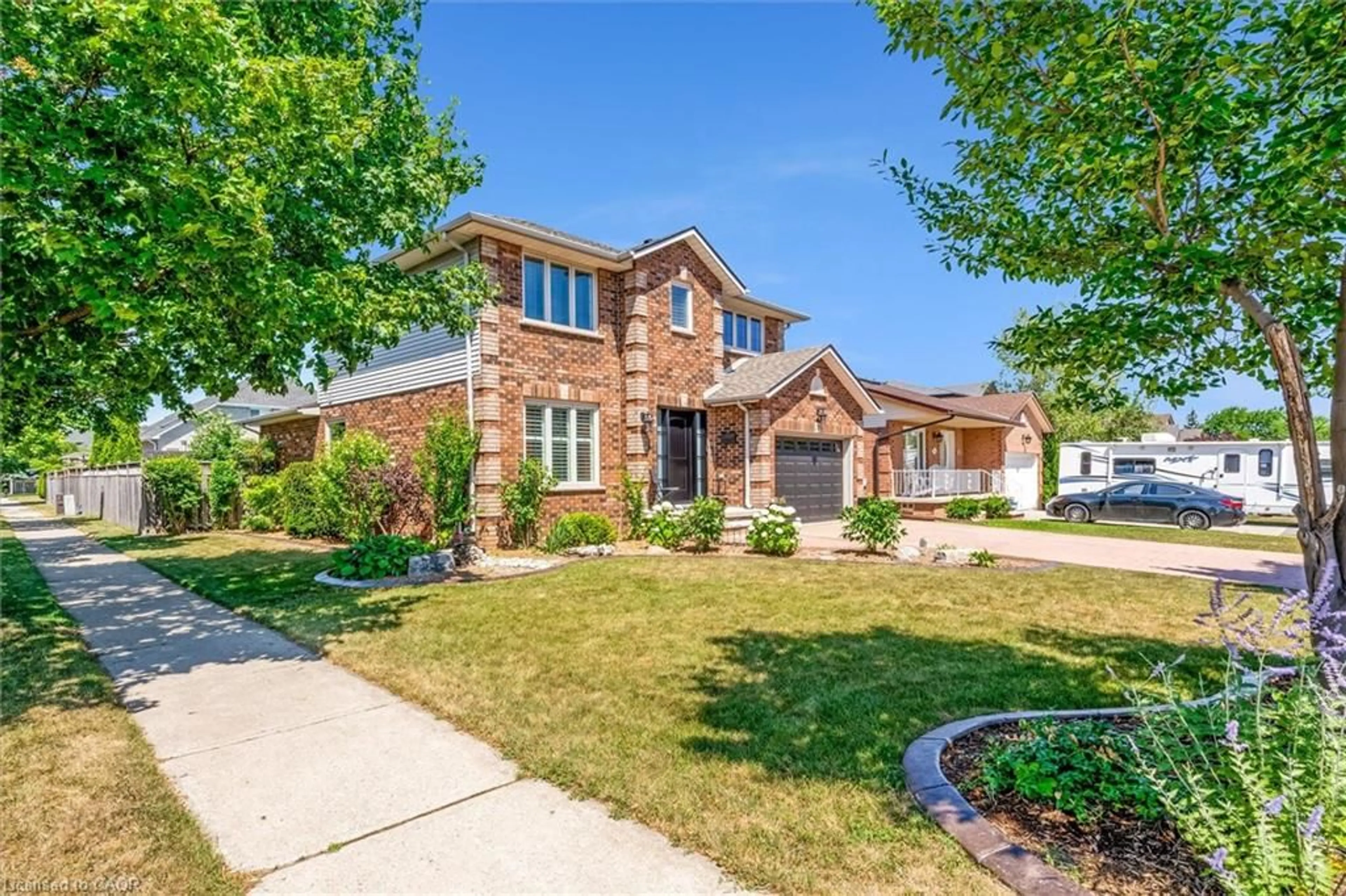 Home with brick exterior material, street for 239 Fruitland Rd, Stoney Creek Ontario L8E 5J8