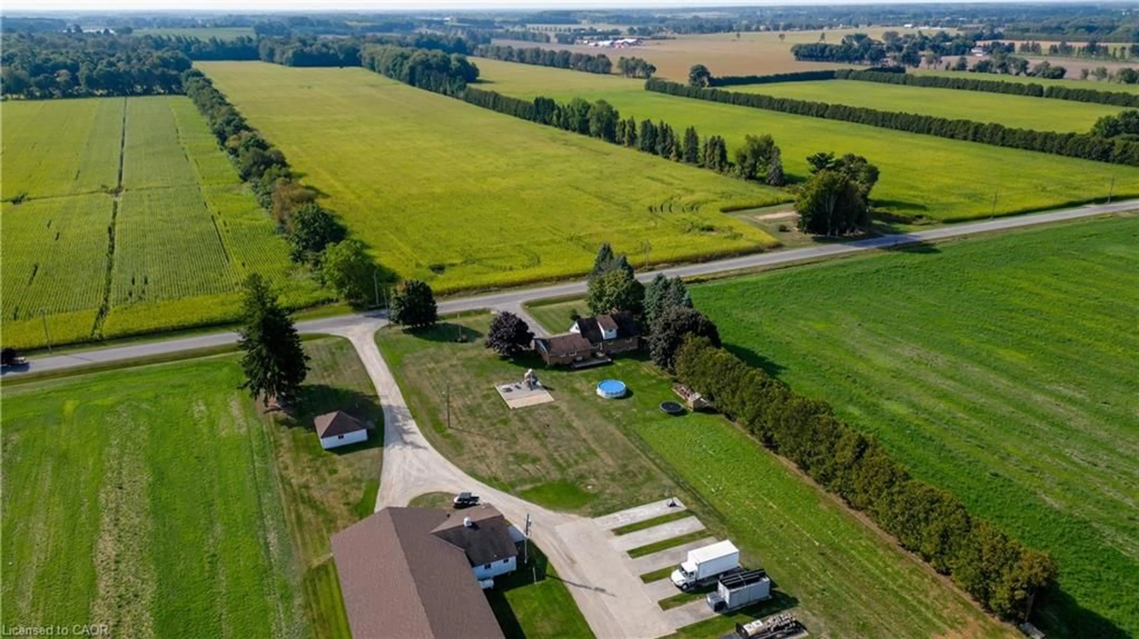 A pic from outside/outdoor area/front of a property/back of a property/a pic from drone, street for 129 Windham Road 2 St, Delhi Ontario N0J 1P0