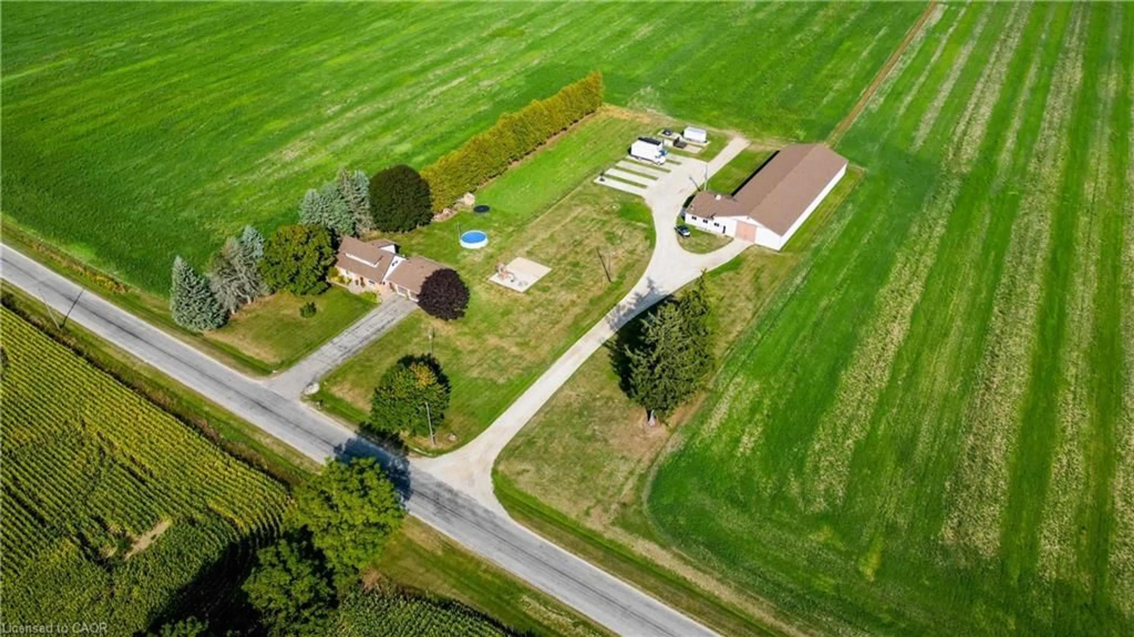 A pic from outside/outdoor area/front of a property/back of a property/a pic from drone, street for 129 Windham Road 2 St, Delhi Ontario N0J 1P0