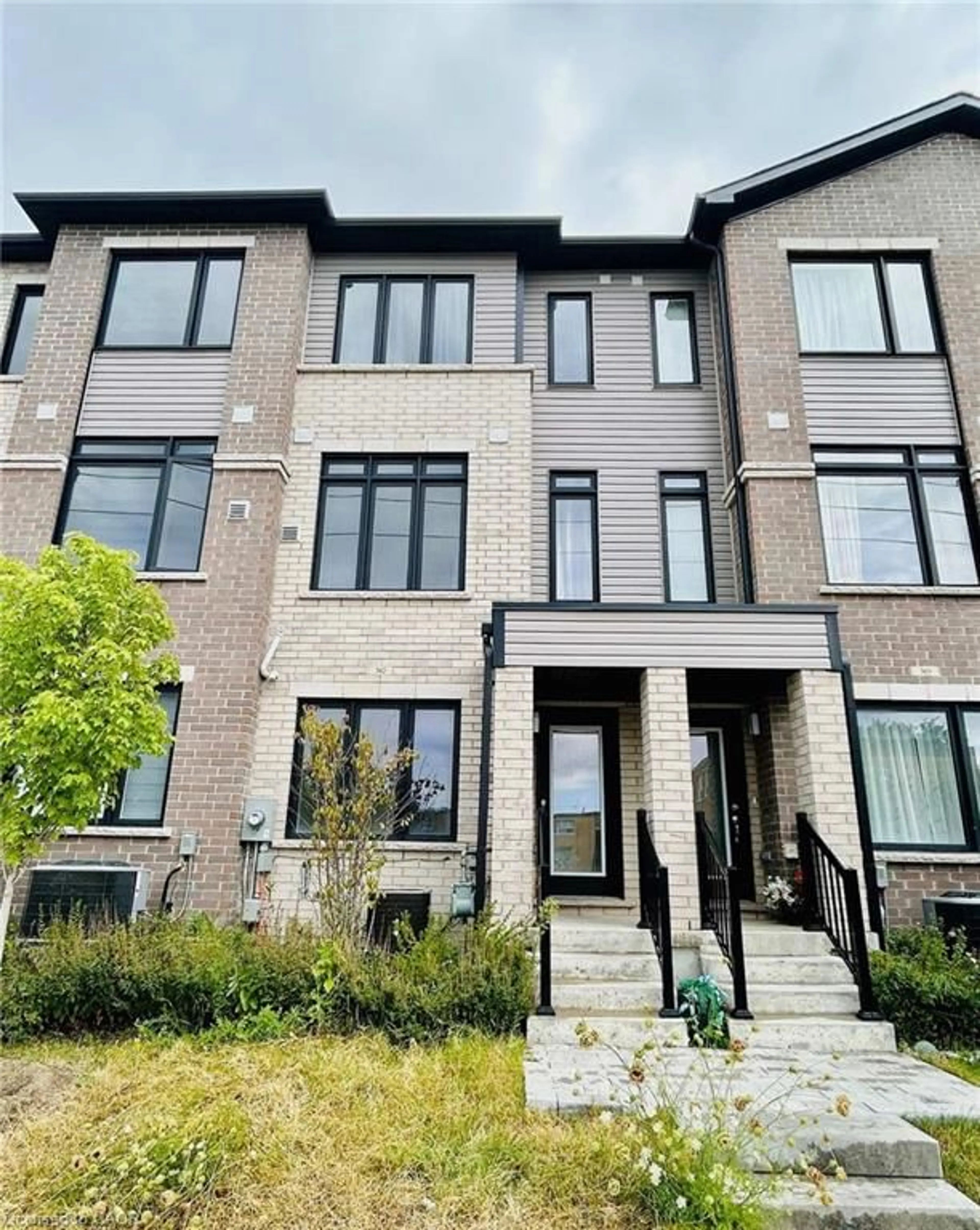 Home with brick exterior material, street for 585 Colborne St #302, Brantford Ontario N3S 0K4